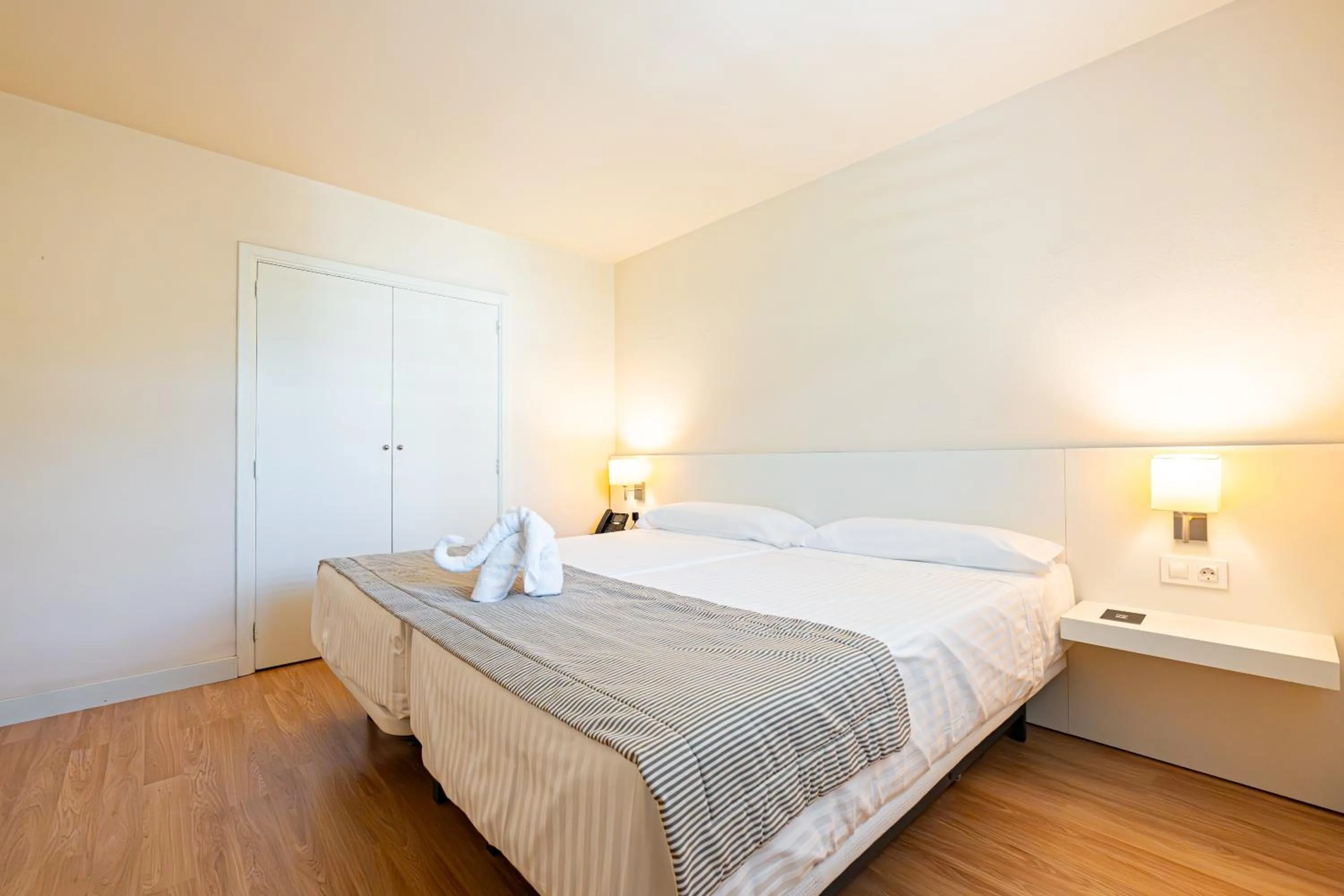 Bedroom, Bed in Hotel Rosella affiliated by Intelier