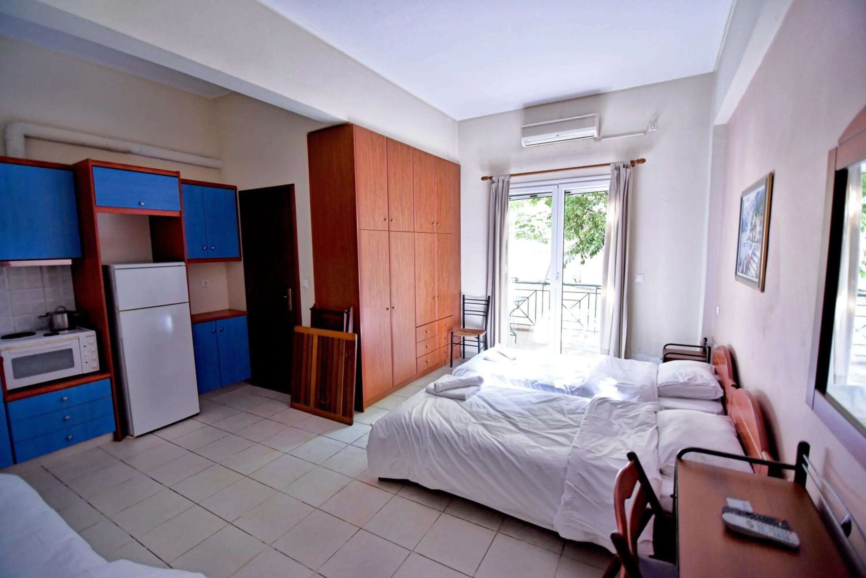 Bed in Tsertos Apartments