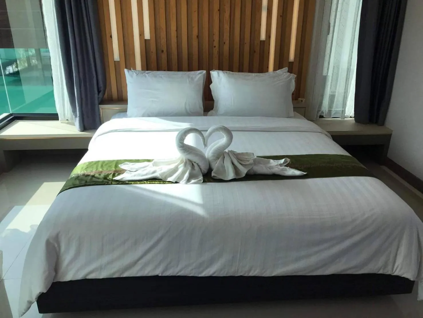 Bed in Boat House Boutique Riverside