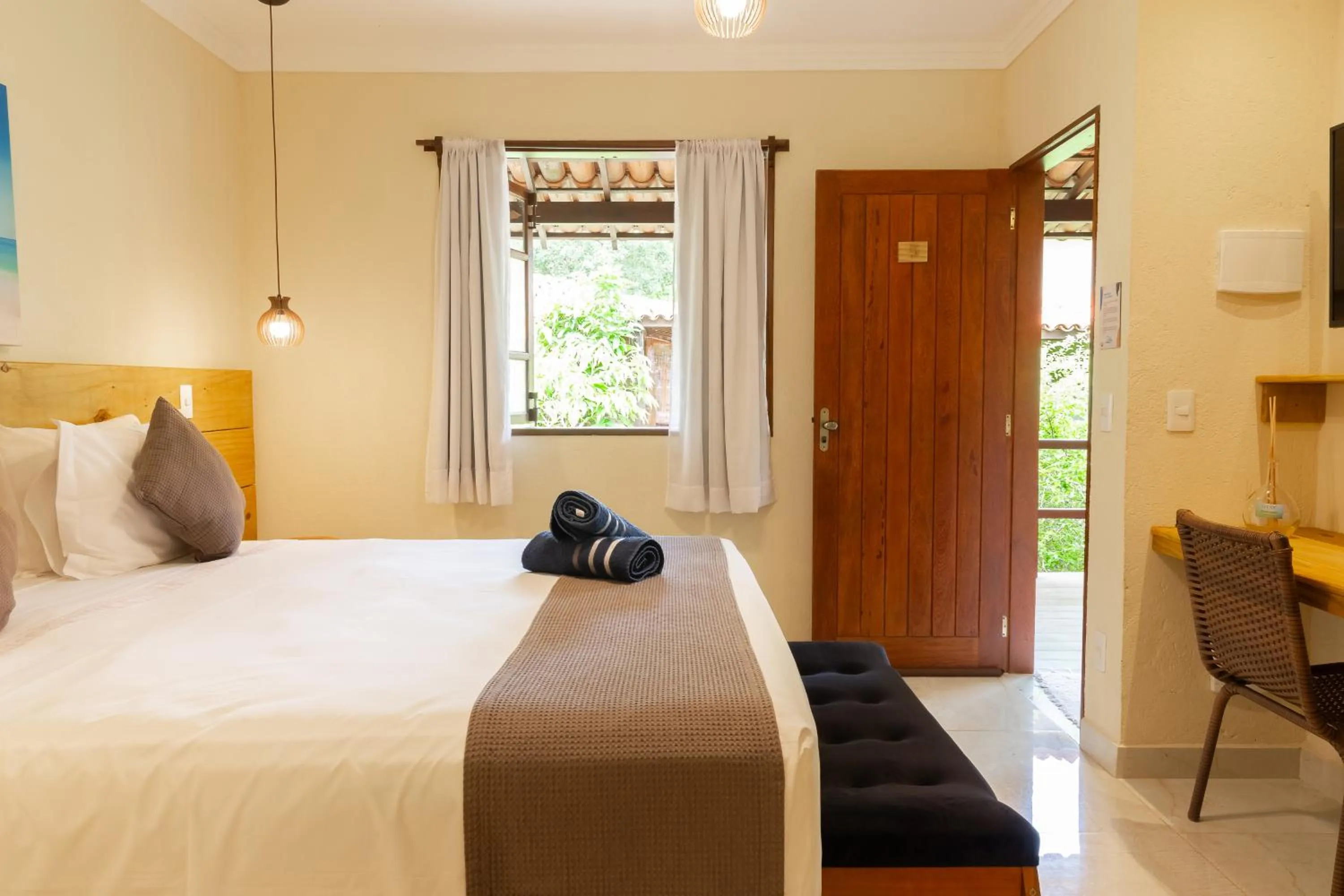 Photo of the whole room, Bed in Hotel Pousada Villa Zena - Frente ao Mar - Pé na areia