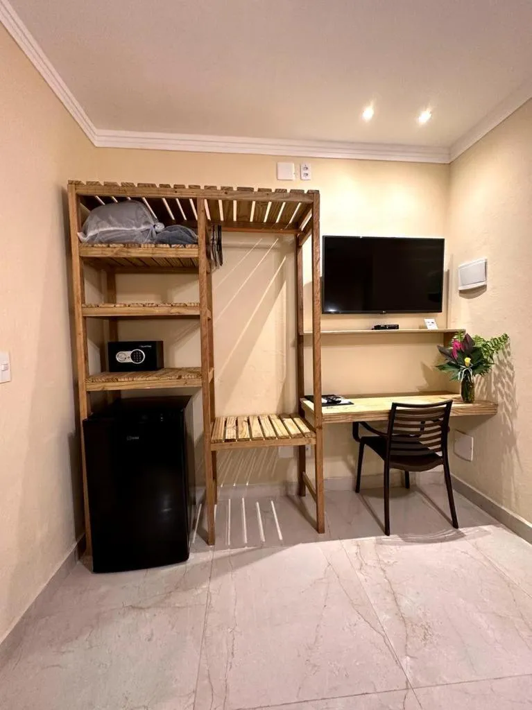 TV and multimedia in Hotel Pousada Villa Zena - Frente ao Mar - Pé na areia