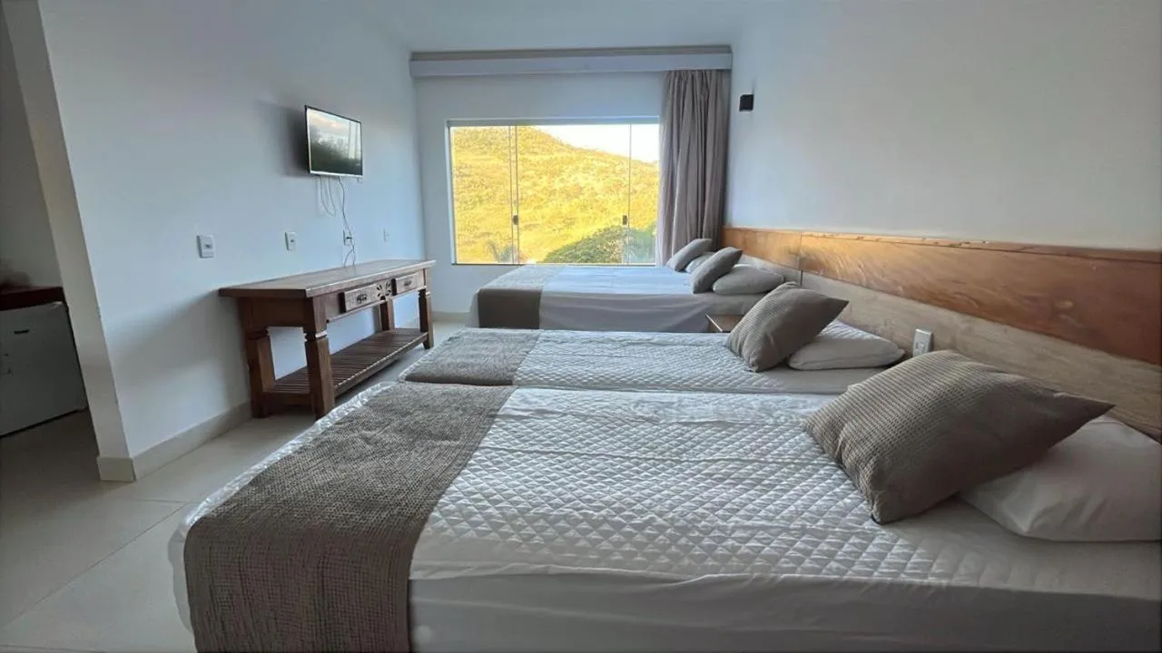 Bed in Pousada do Rio Turvo