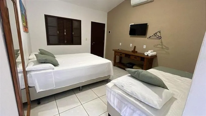 Bed in Pousada do Rio Turvo