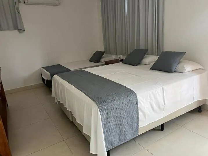 Bed in Pousada do Rio Turvo