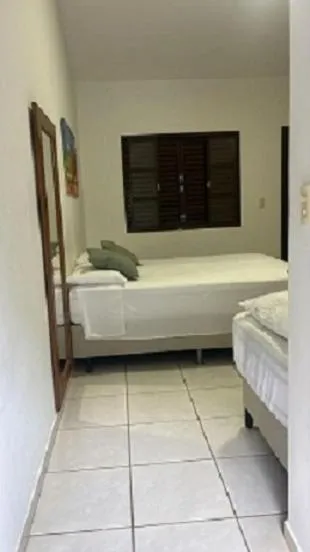 Bed in Pousada do Rio Turvo