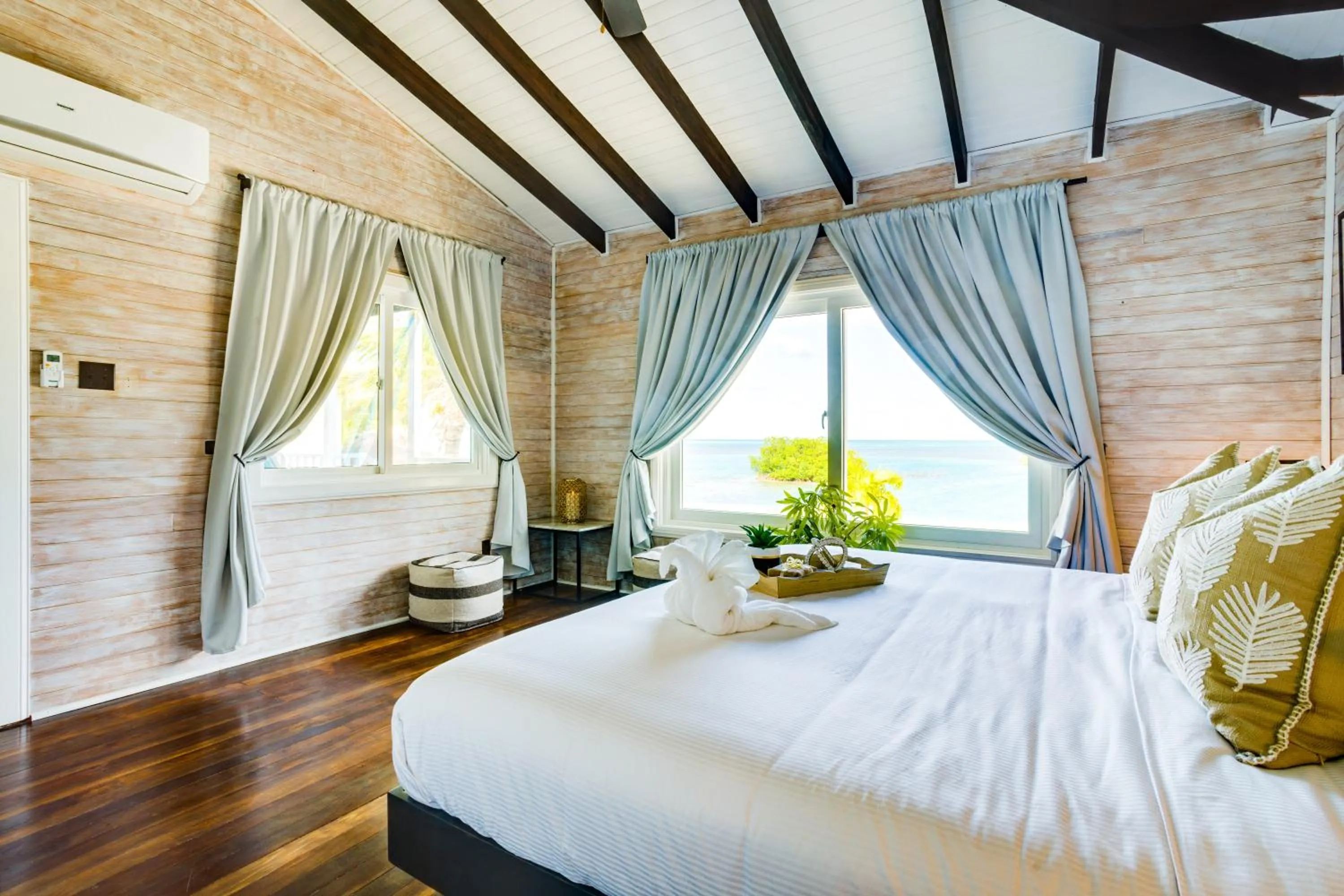 Bed in Shaka Caye All inclusive Resort