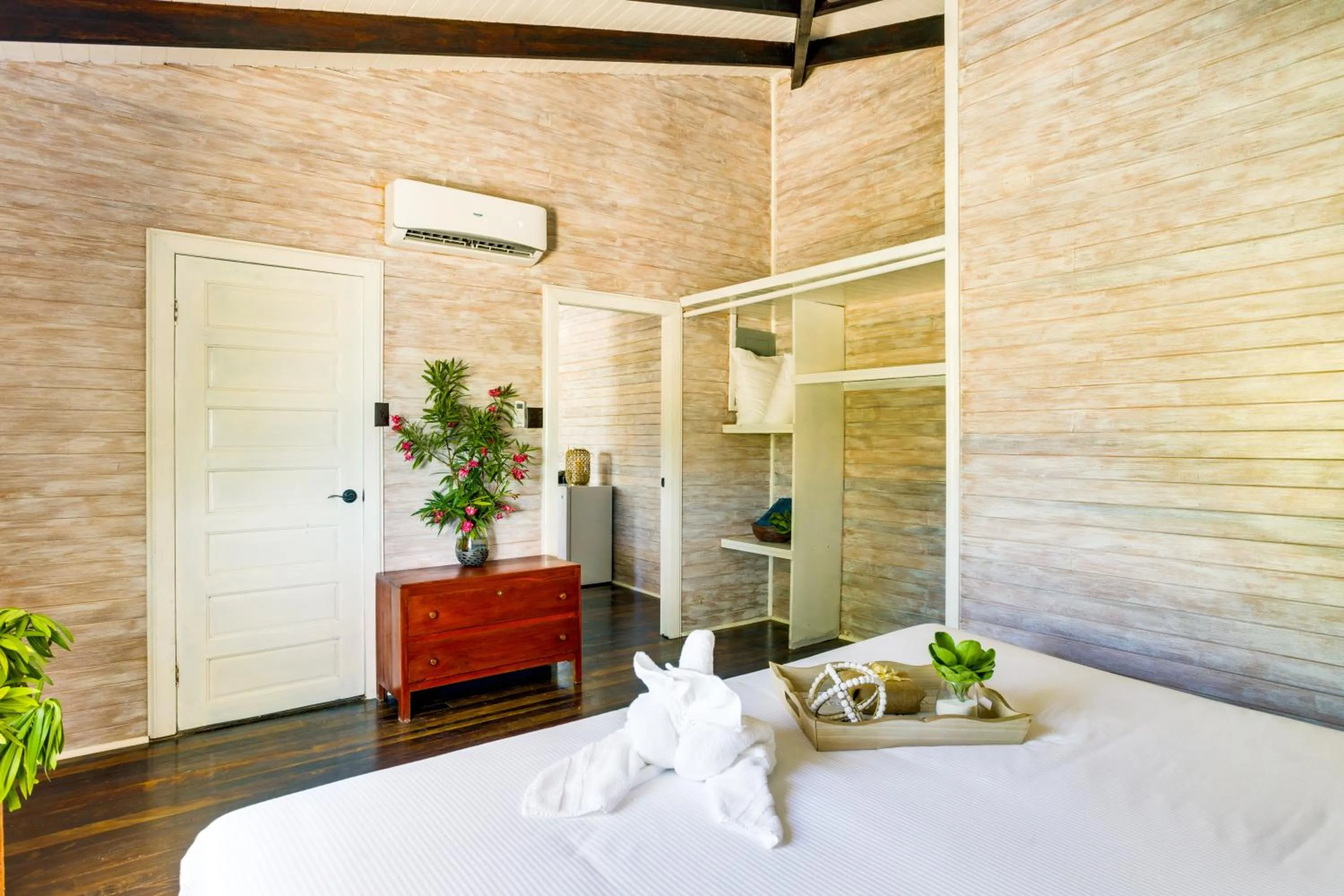 Bed in Shaka Caye All inclusive Resort