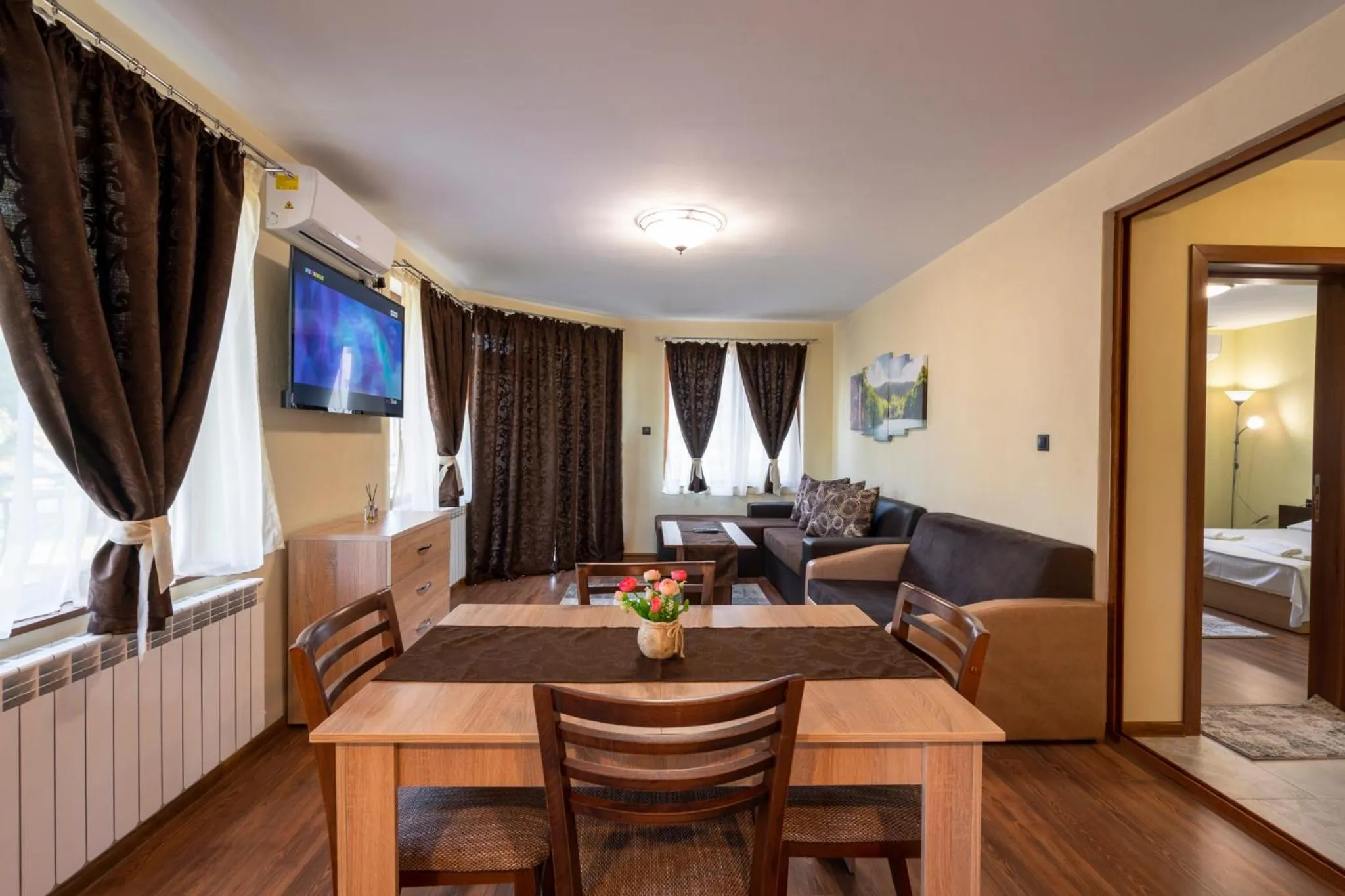 Living room, Bed in Family Hotel Preslav