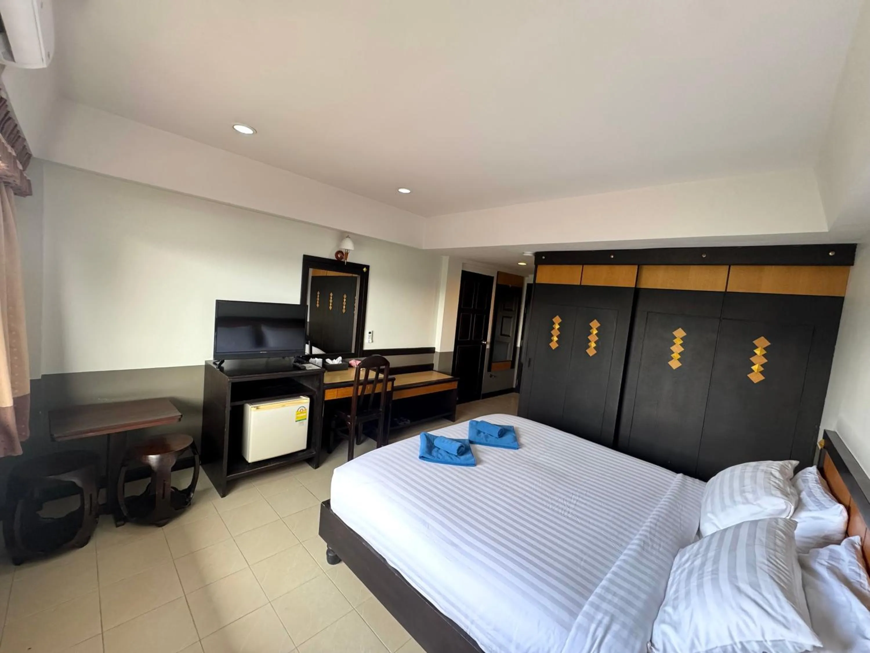 Photo of the whole room, Bed in Ariya inn Chiangrai