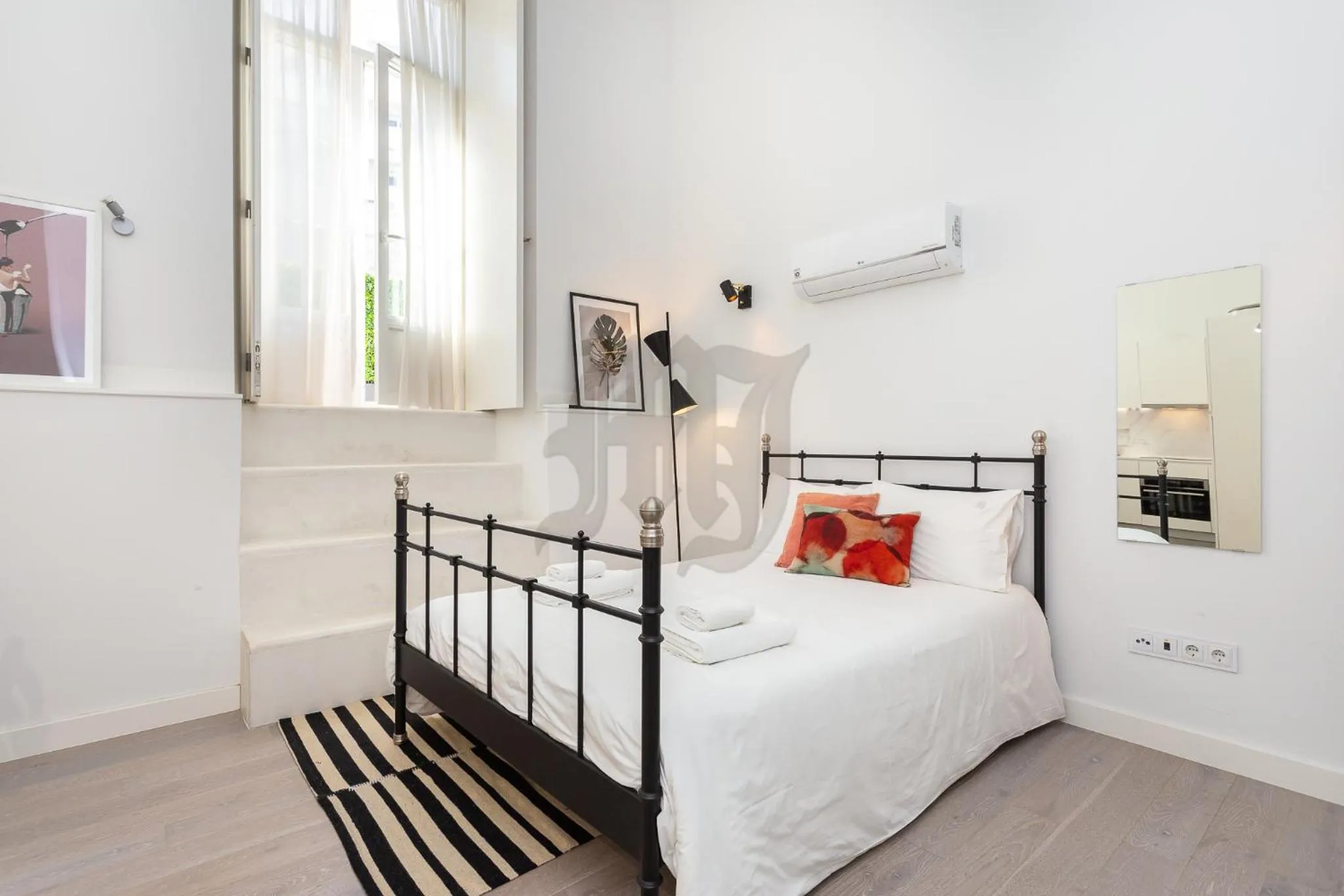 Photo of the whole room, Bed in Morgan-Jupiter Apartments