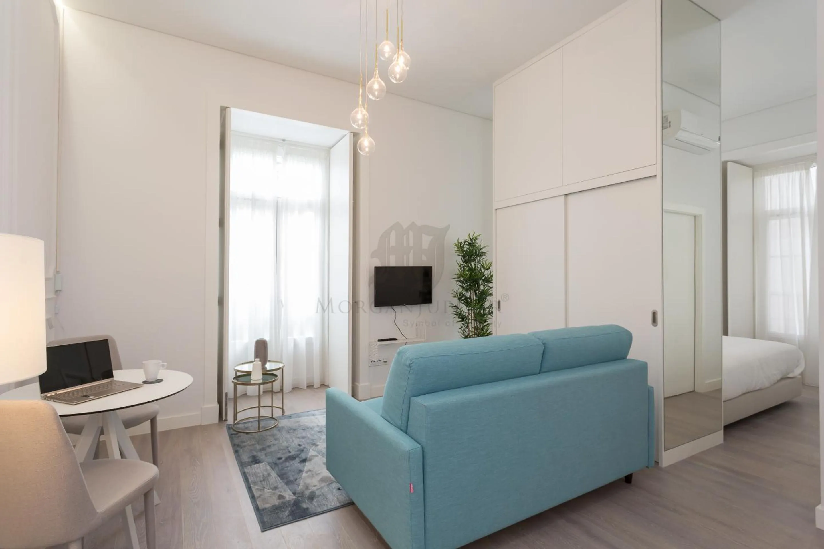 TV and multimedia, Bed in Morgan-Jupiter Apartments