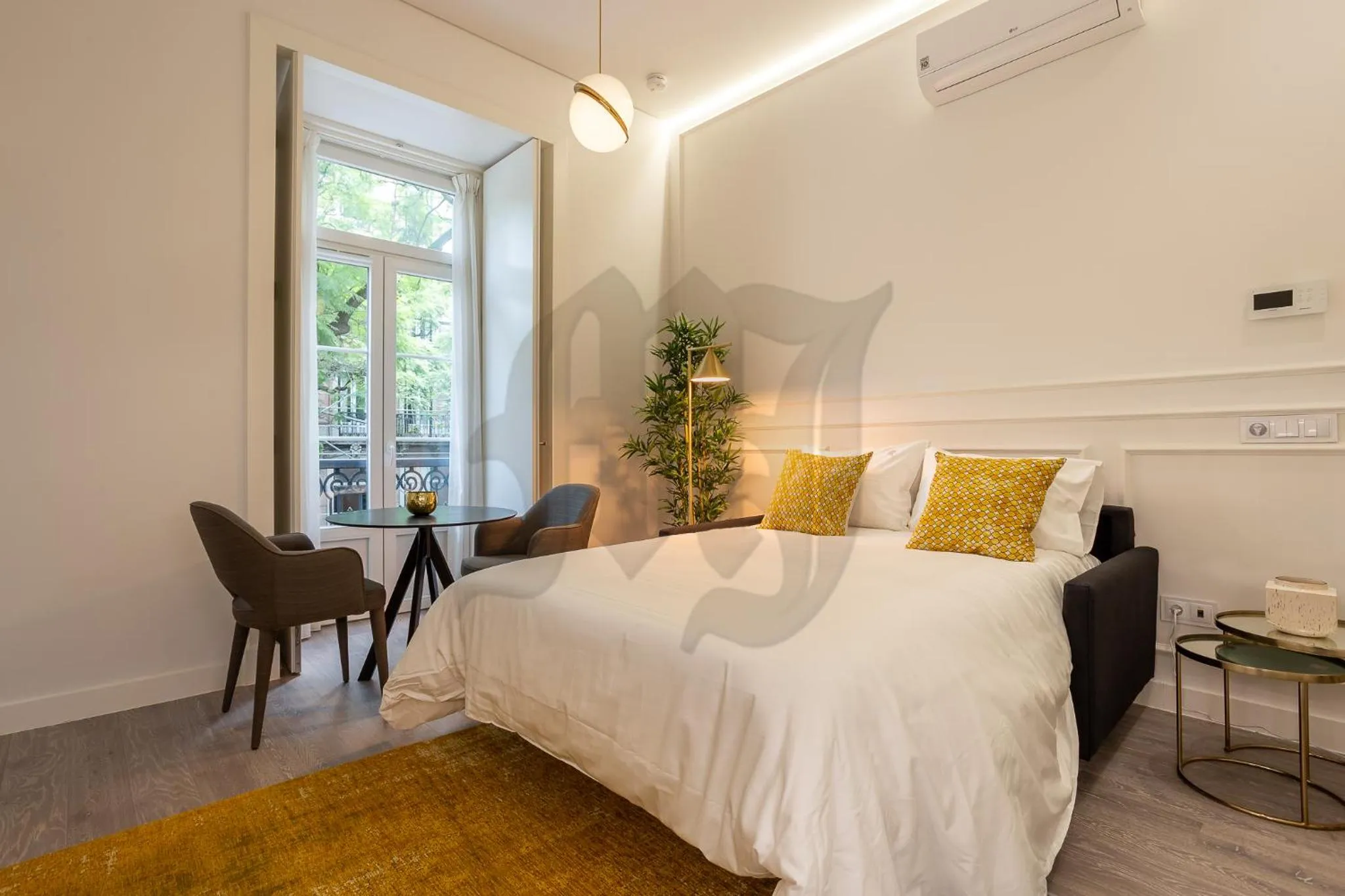 Living room, Bed in Morgan-Jupiter Apartments