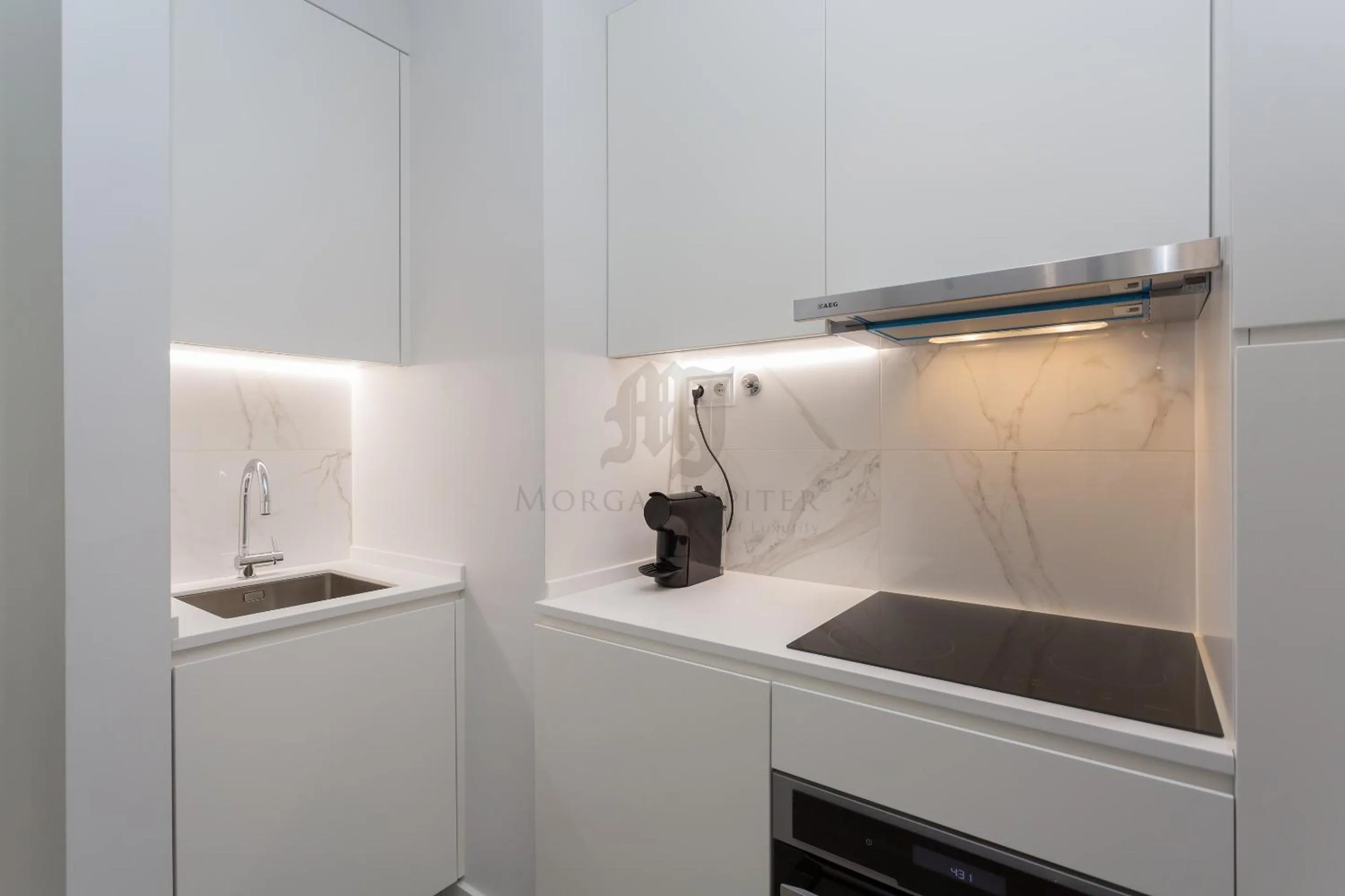 Kitchen or kitchenette in Morgan-Jupiter Apartments