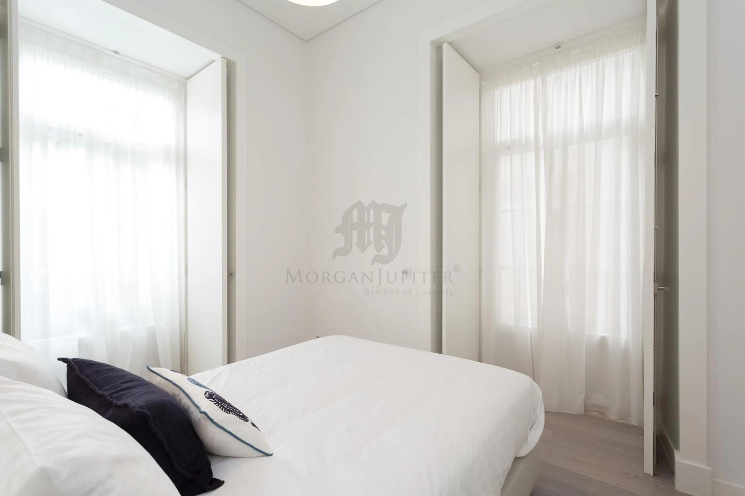 Photo of the whole room, Bed in Morgan-Jupiter Apartments