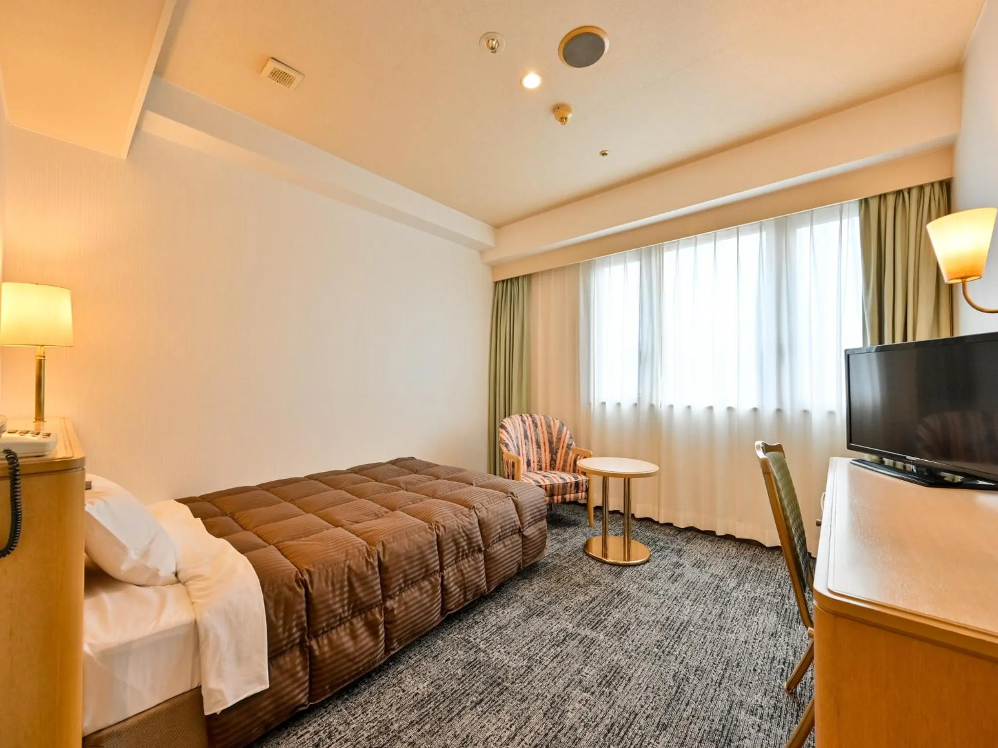 Bed in Hotel Sun Valley Annex