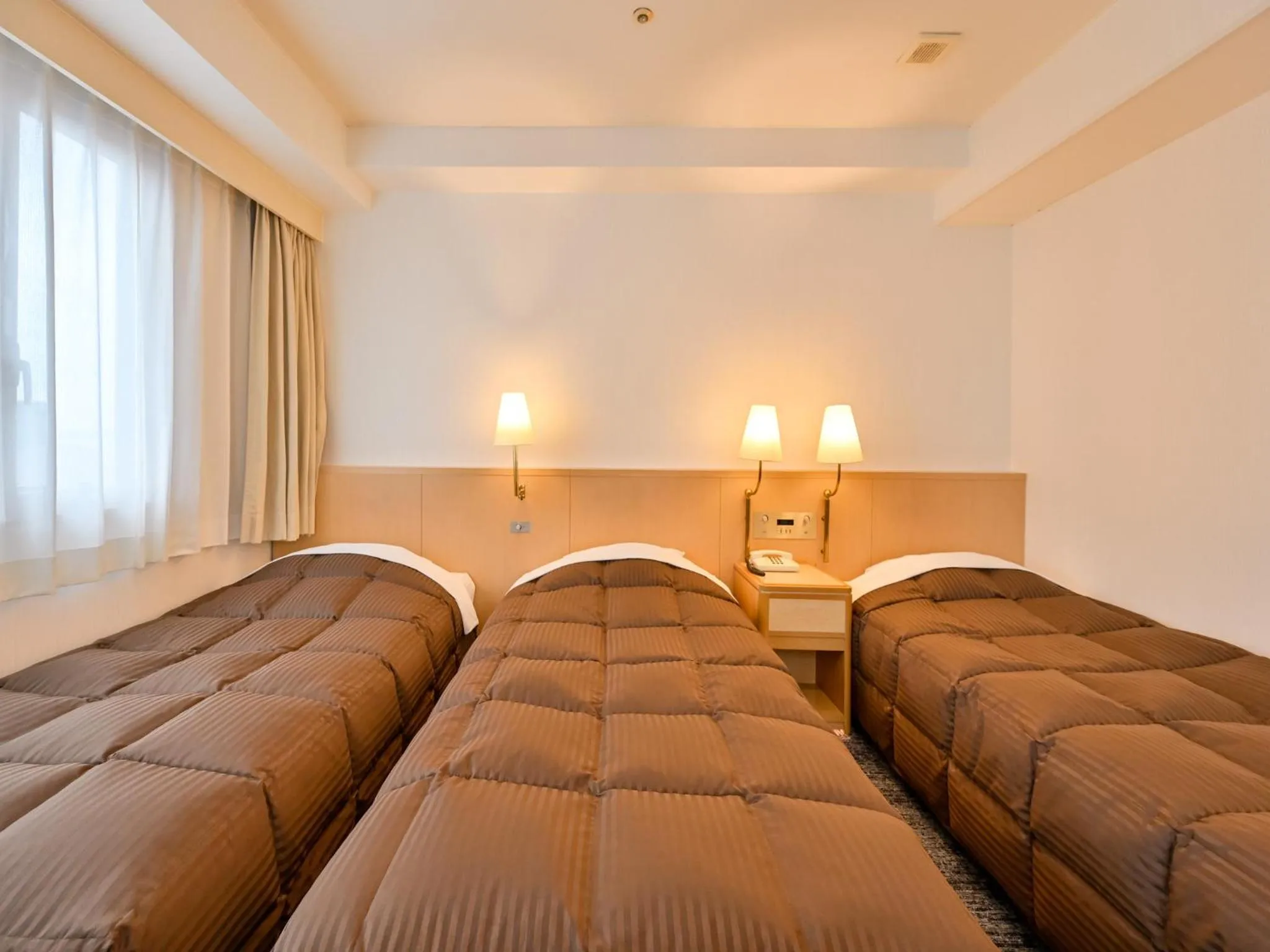 Bed in Hotel Sun Valley Annex