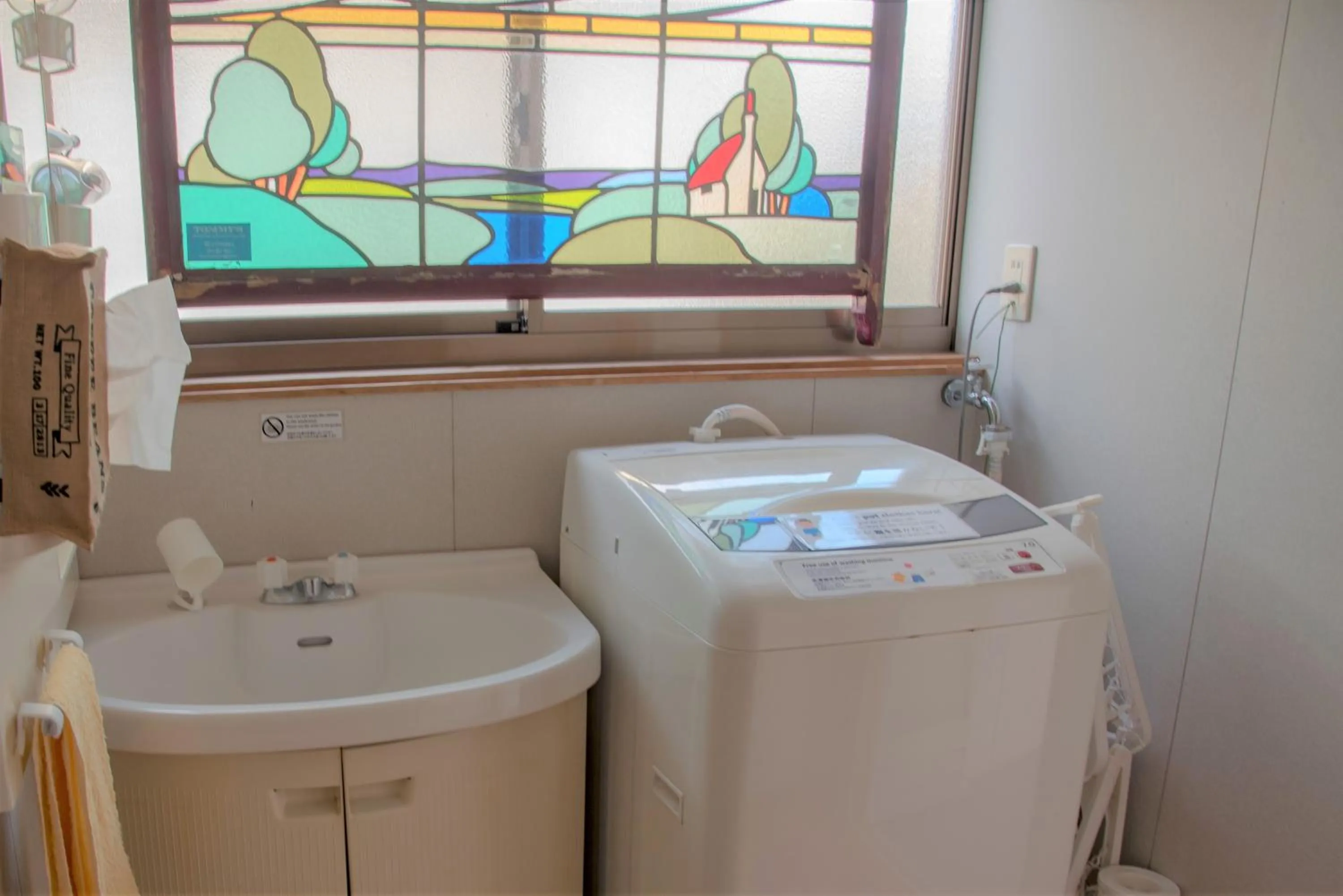 washing machine in Guest House Asora