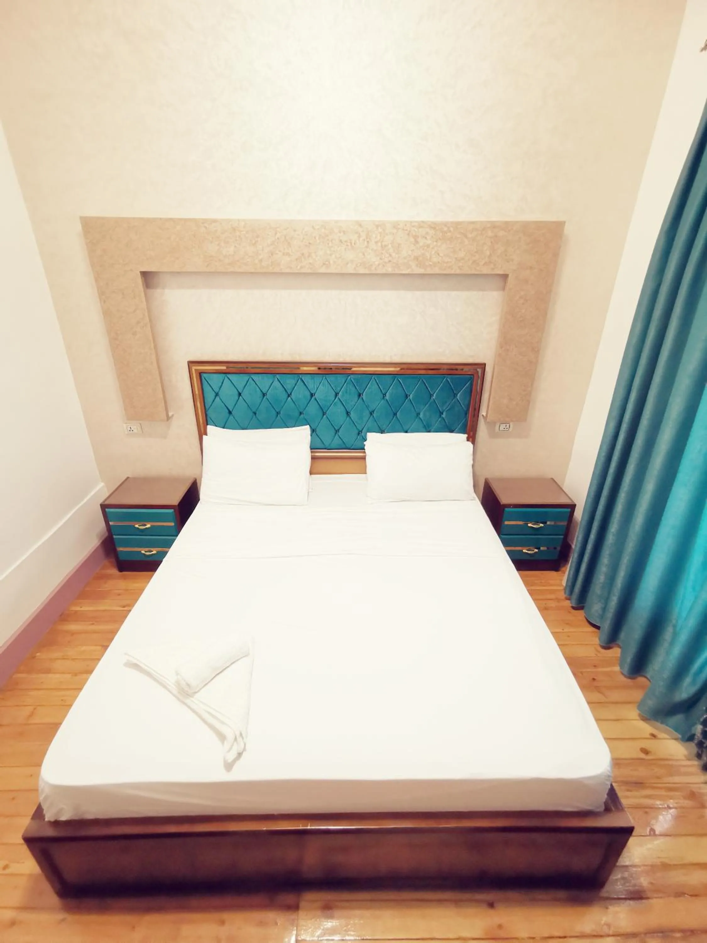 Bed in Golden Palace Hotel