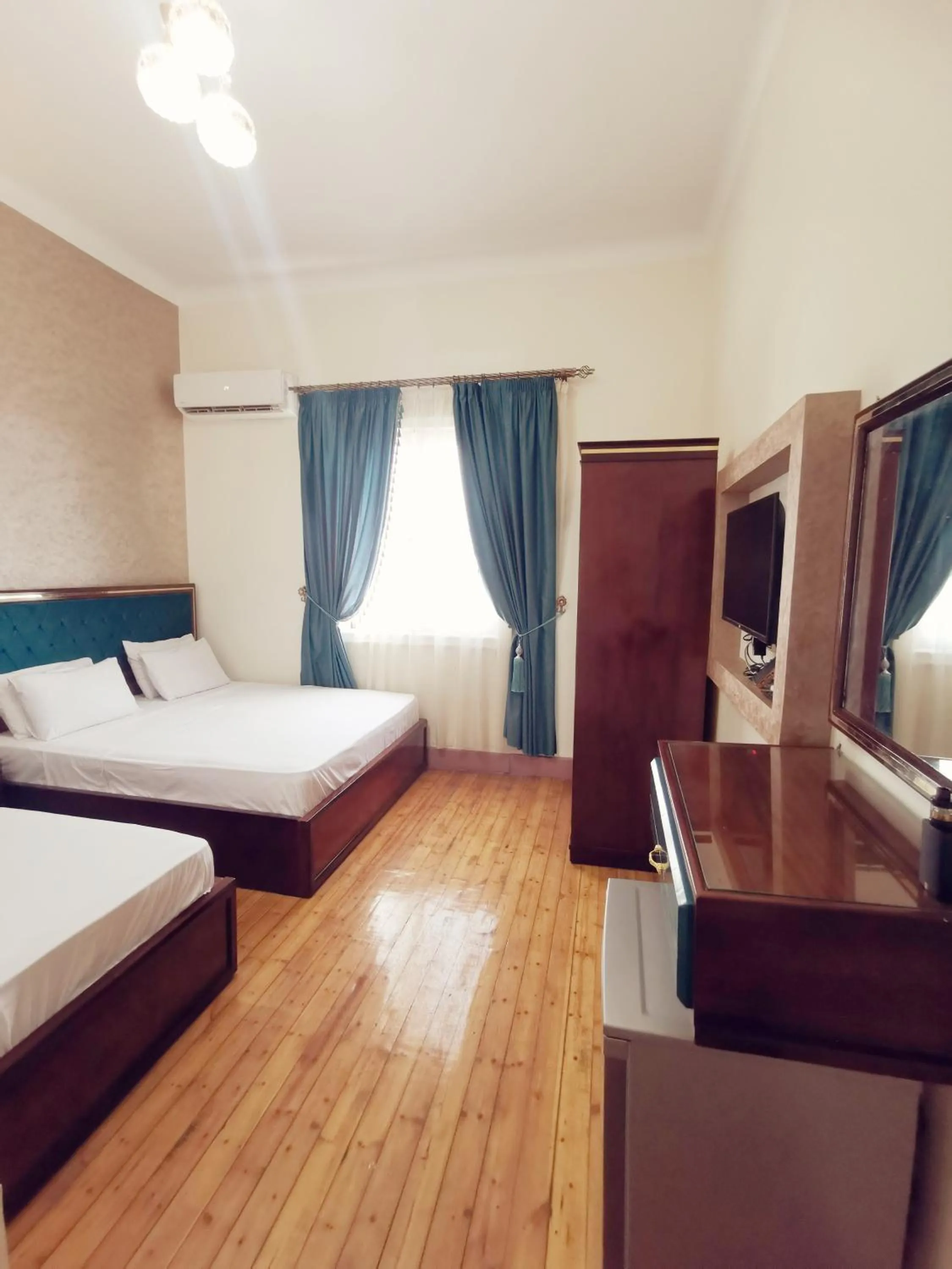 Bed in Golden Palace Hotel