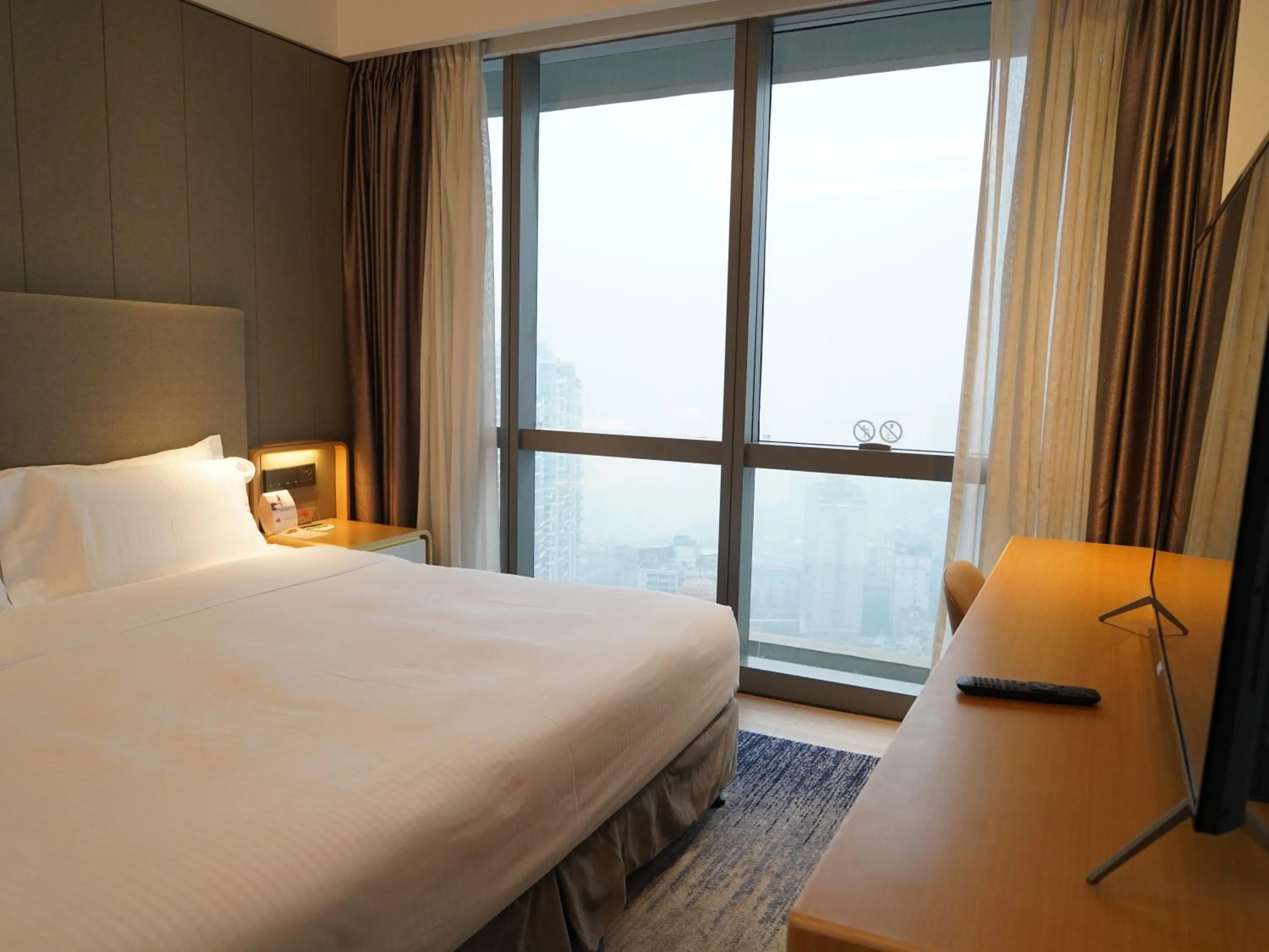 Bed in Ascott Raffles City Chongqing