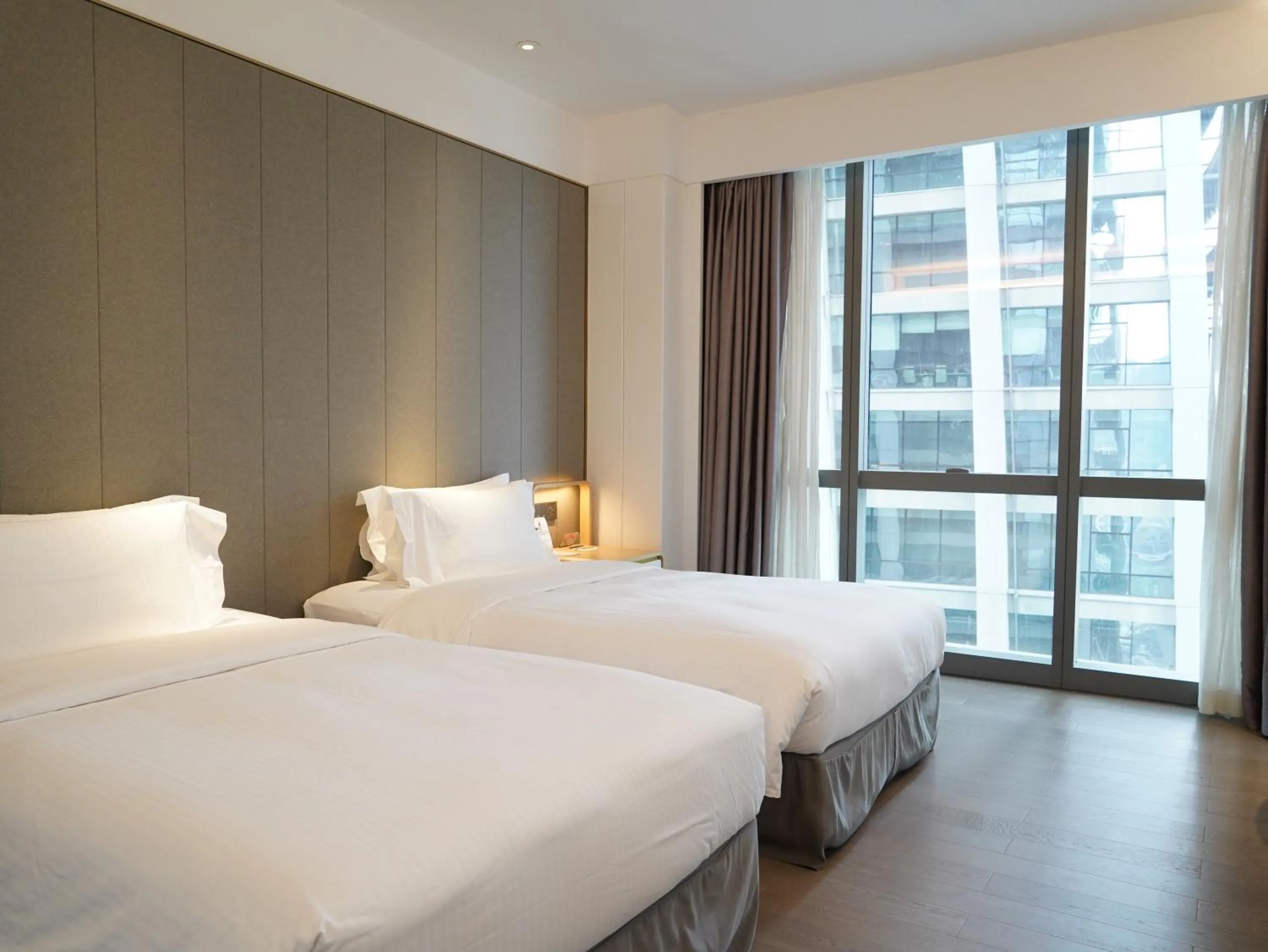 Bed in Ascott Raffles City Chongqing