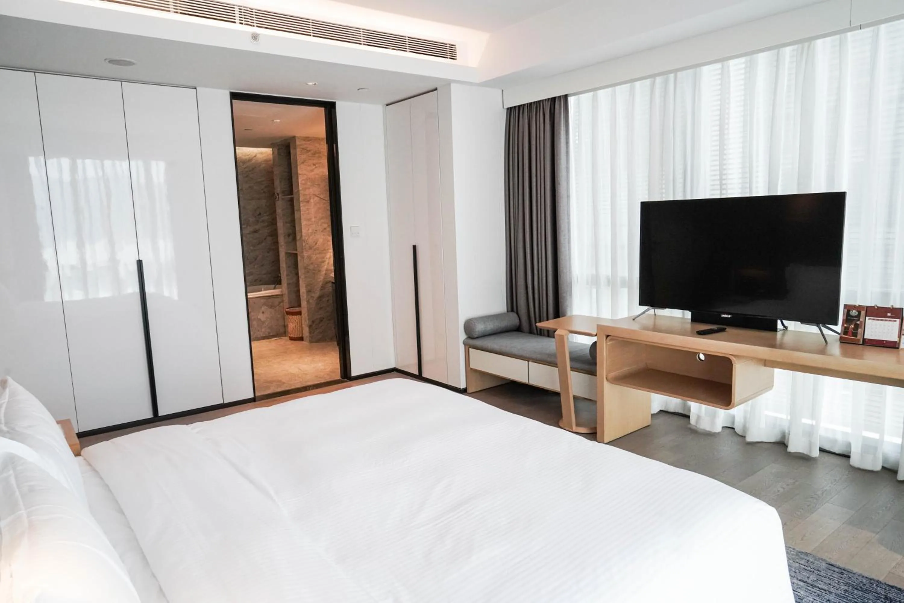 Bed in Ascott Raffles City Chongqing