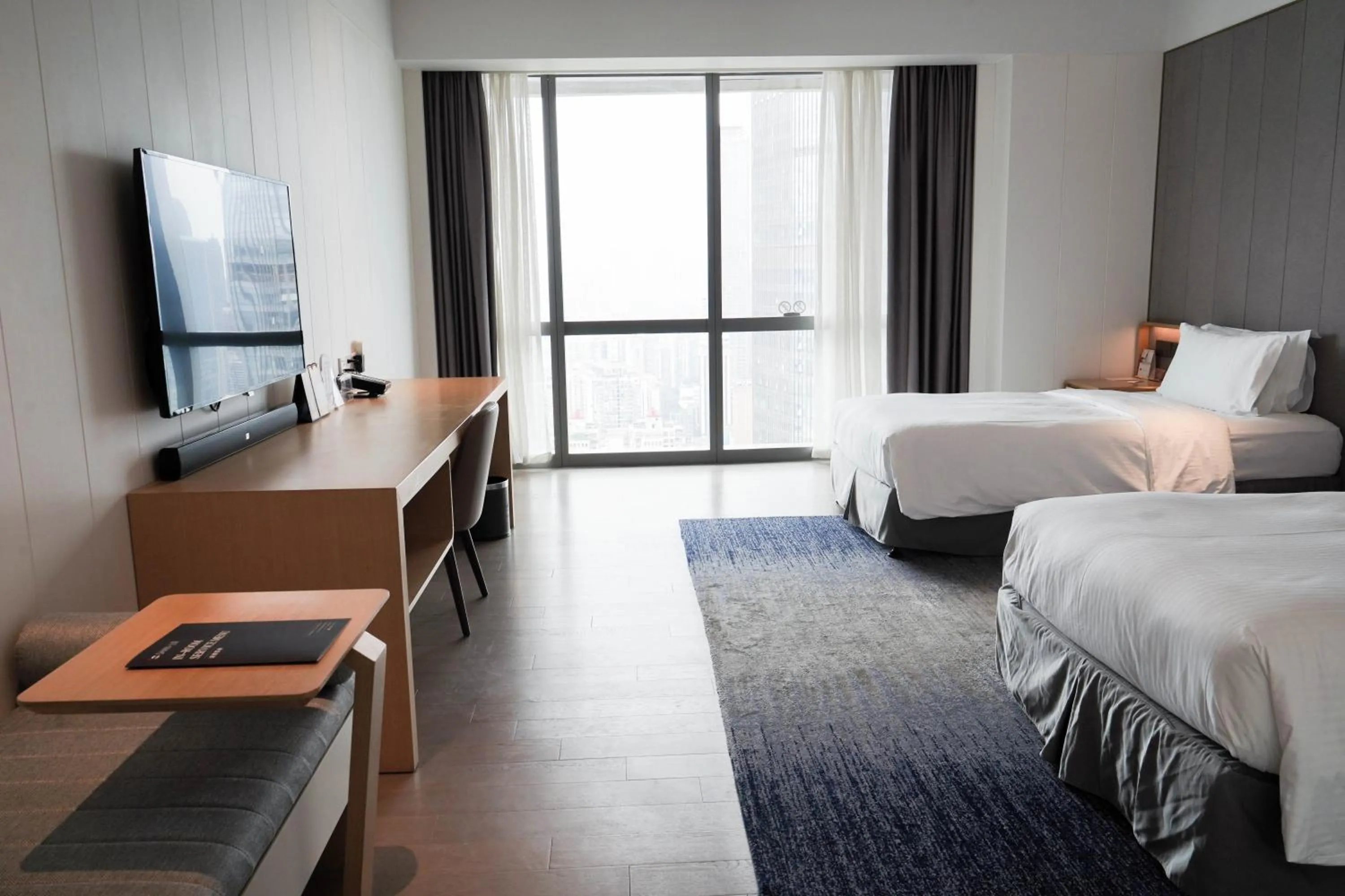 Bed in Ascott Raffles City Chongqing