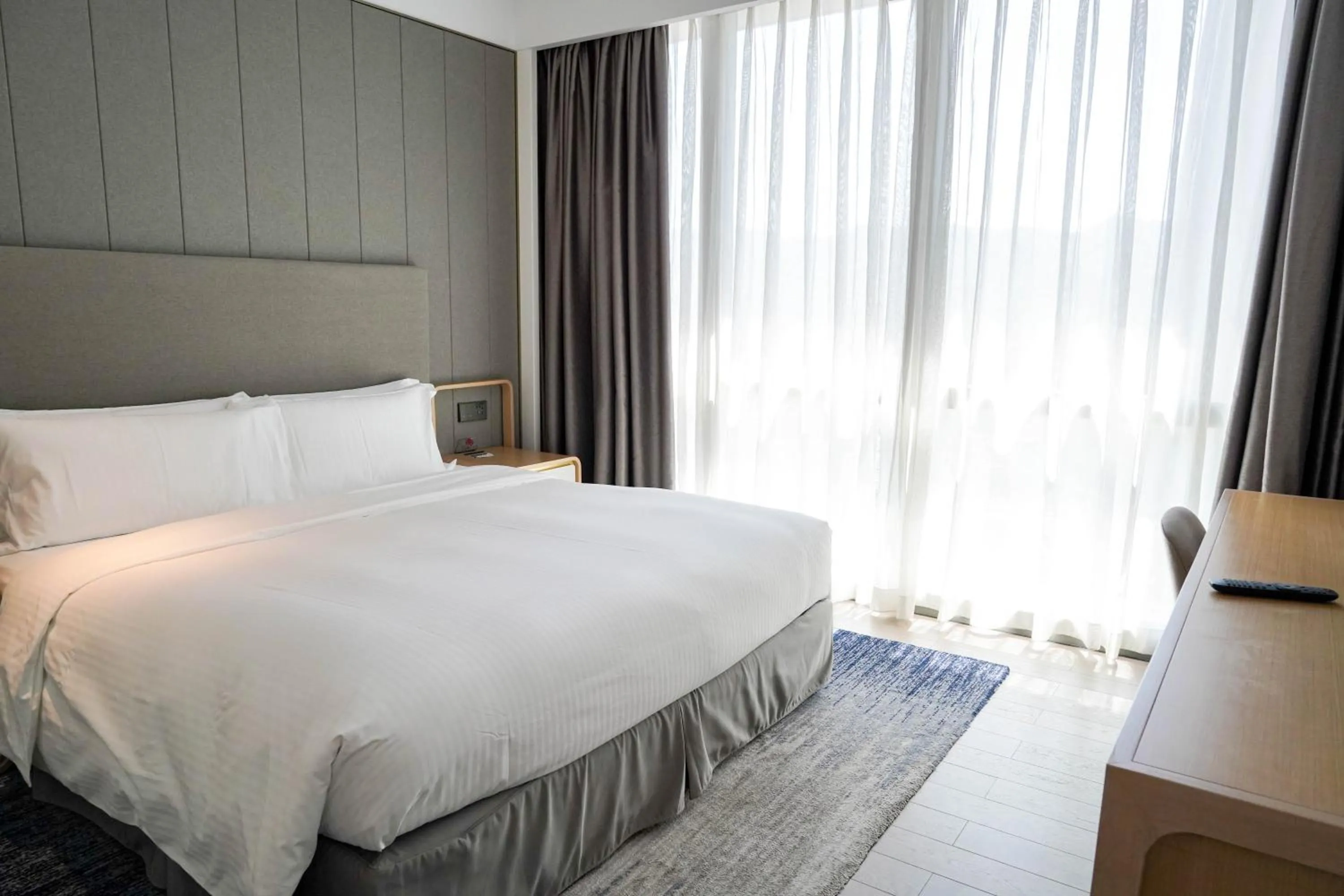 Bed in Ascott Raffles City Chongqing