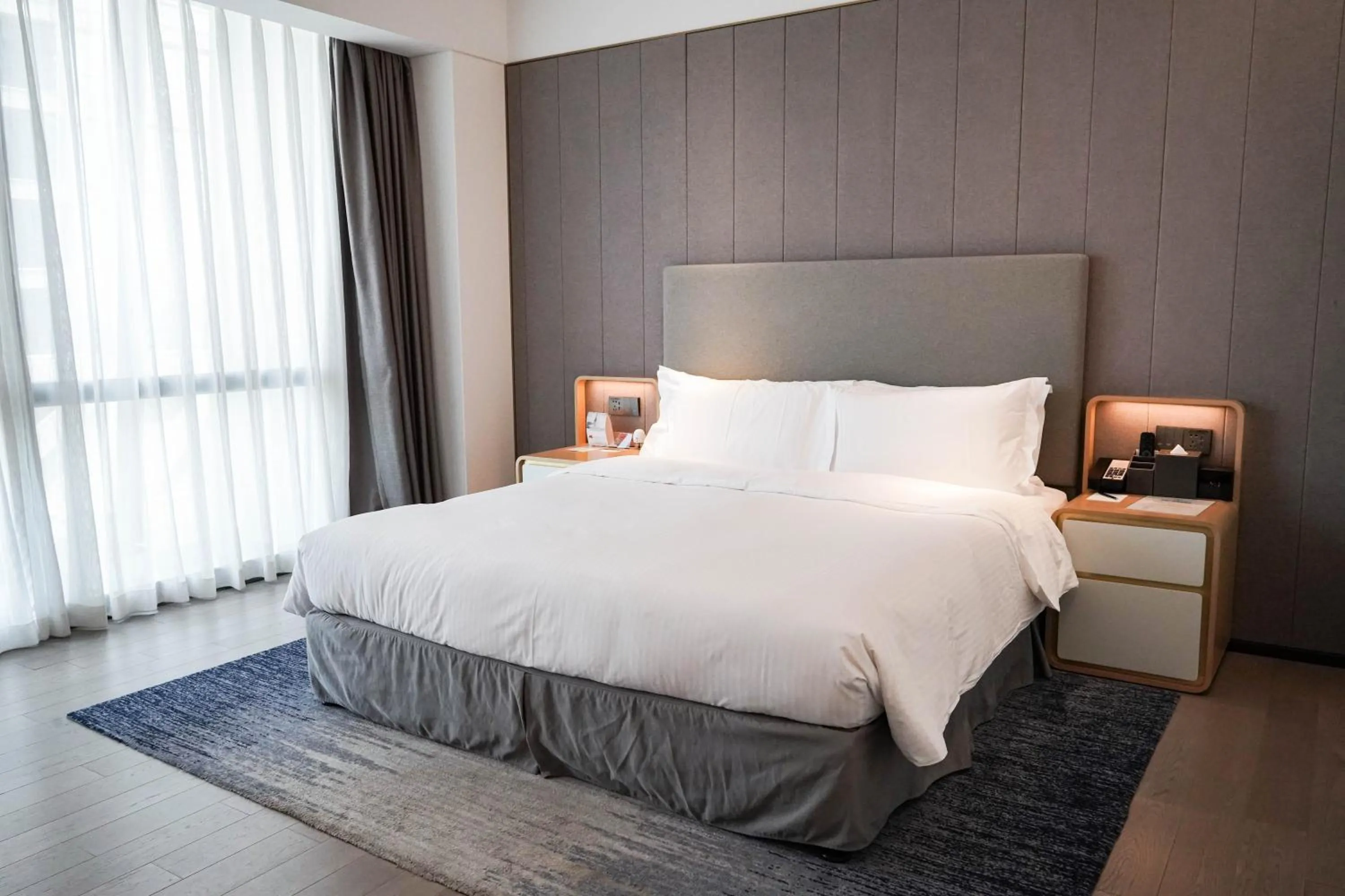 Bed in Ascott Raffles City Chongqing
