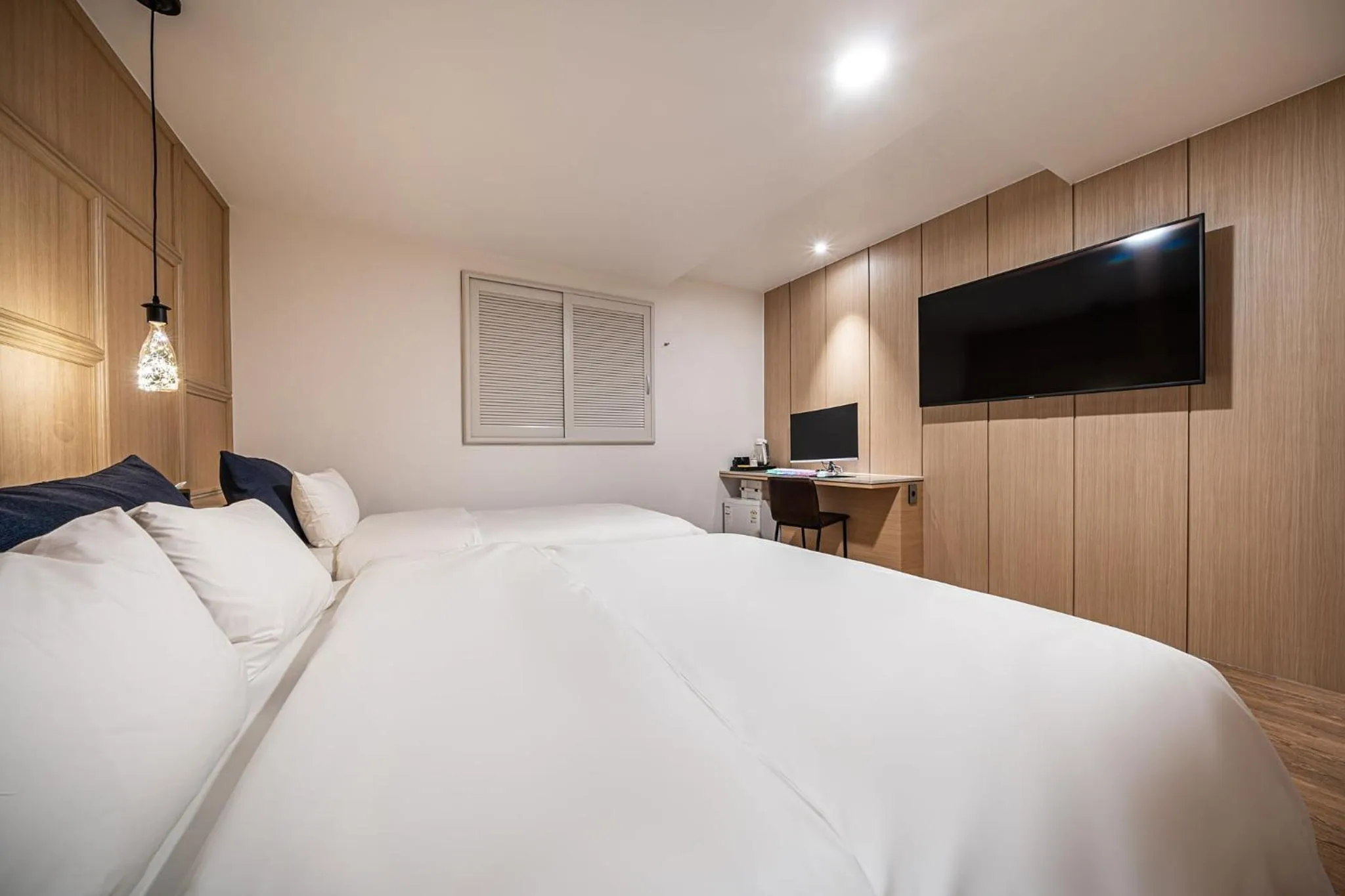 Bed in Stay Month Hotel