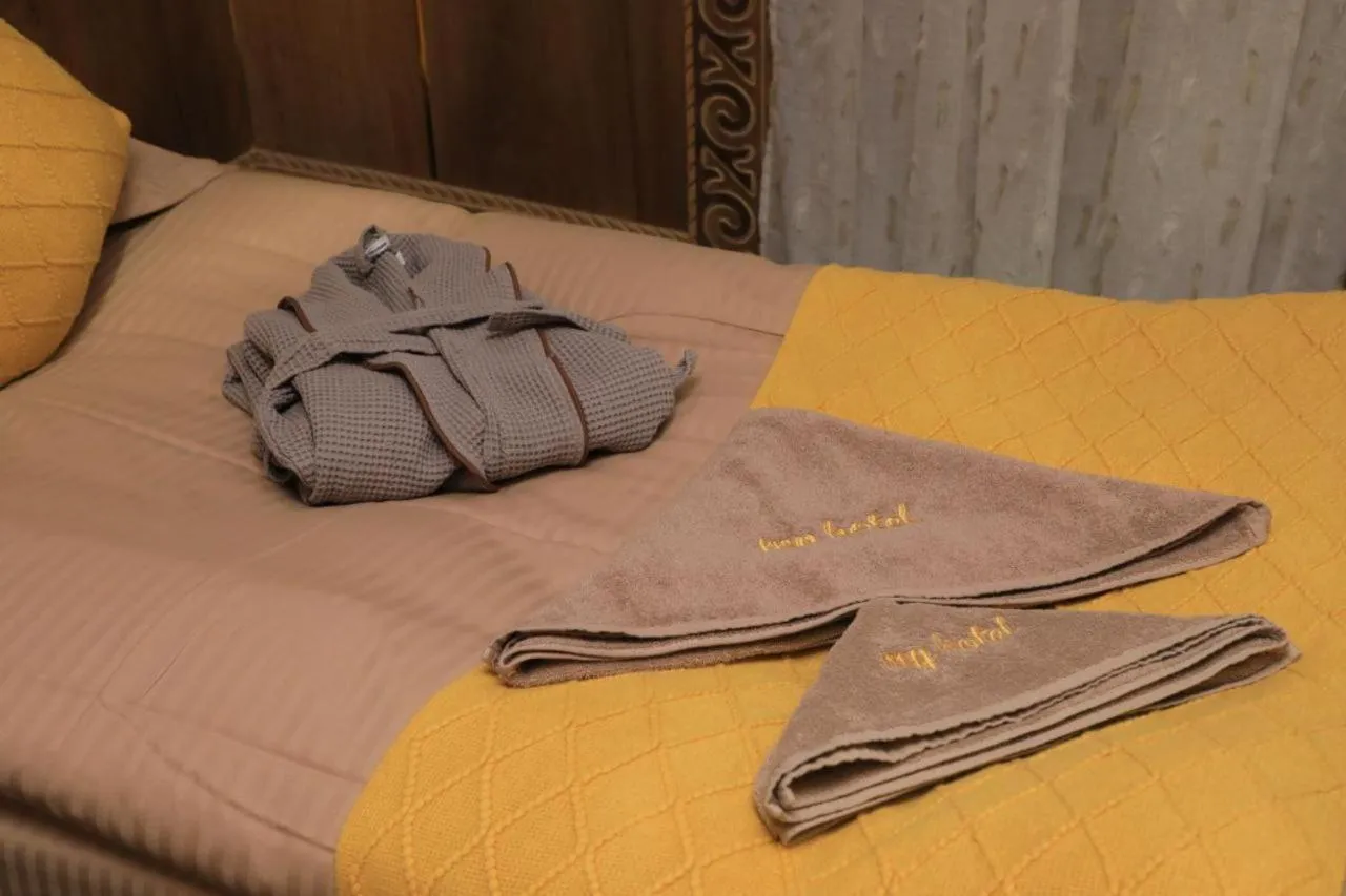 Bed in My hotel Karakol