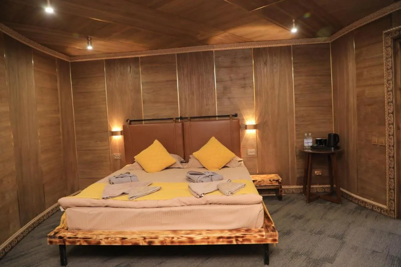 Bed in My hotel Karakol