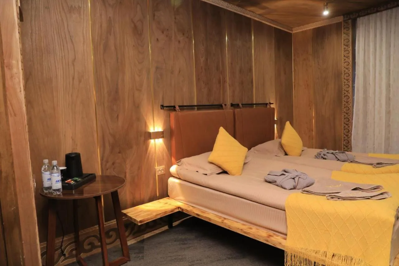 Bed in My hotel Karakol