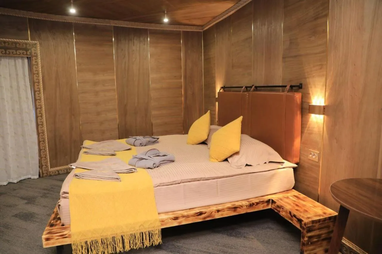 Bed in My hotel Karakol