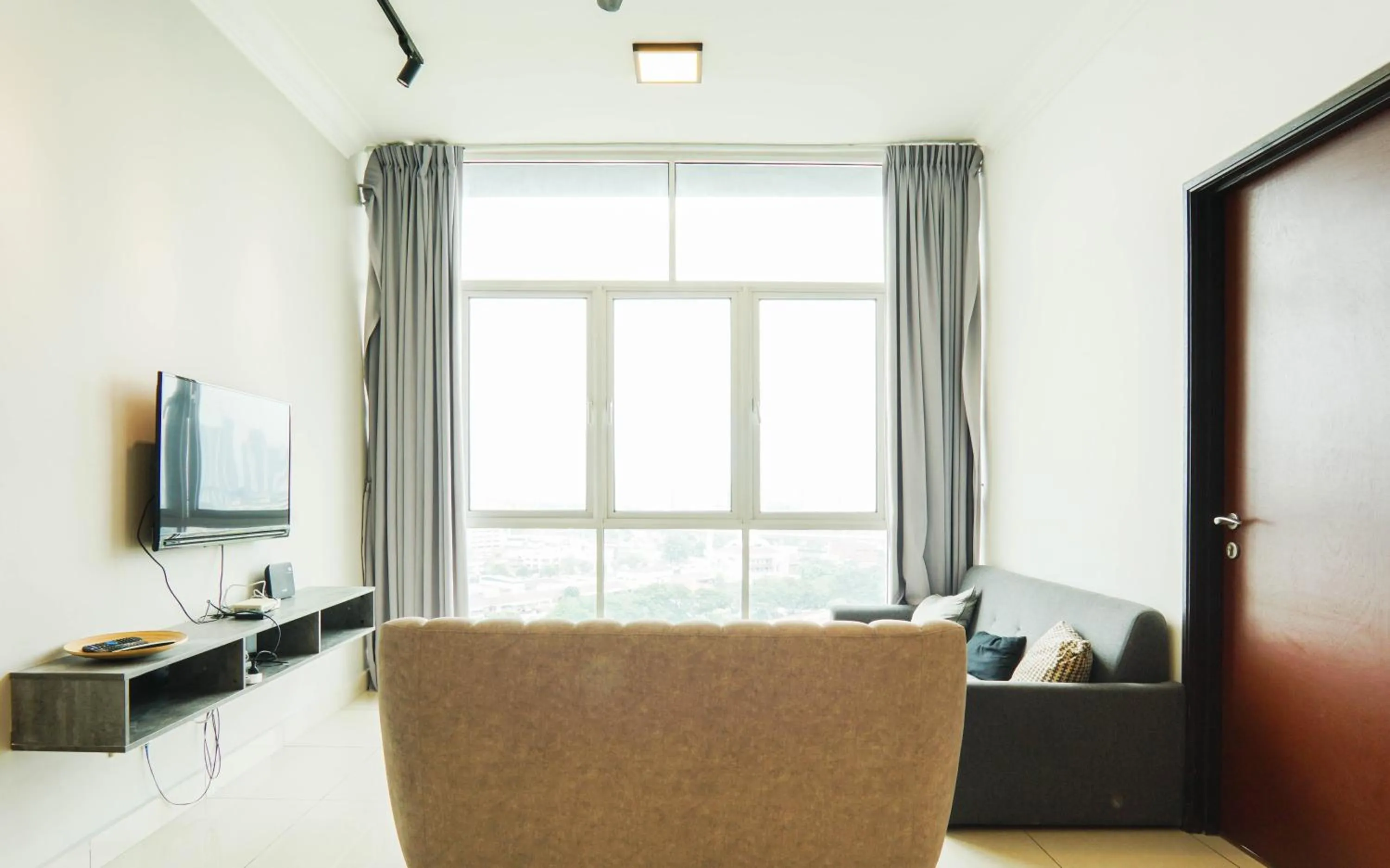 Living room in Boulevard Service Apartment KL by Airhost