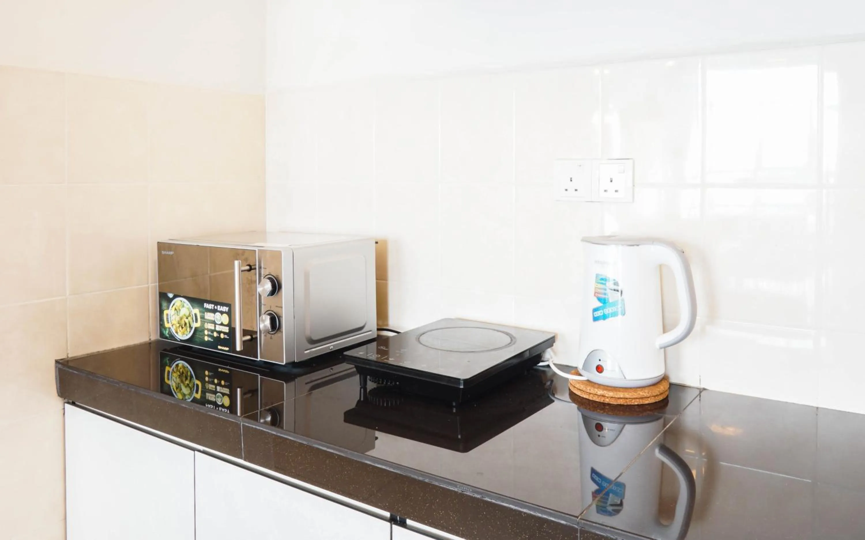 Kitchen or kitchenette in Boulevard Service Apartment KL by Airhost