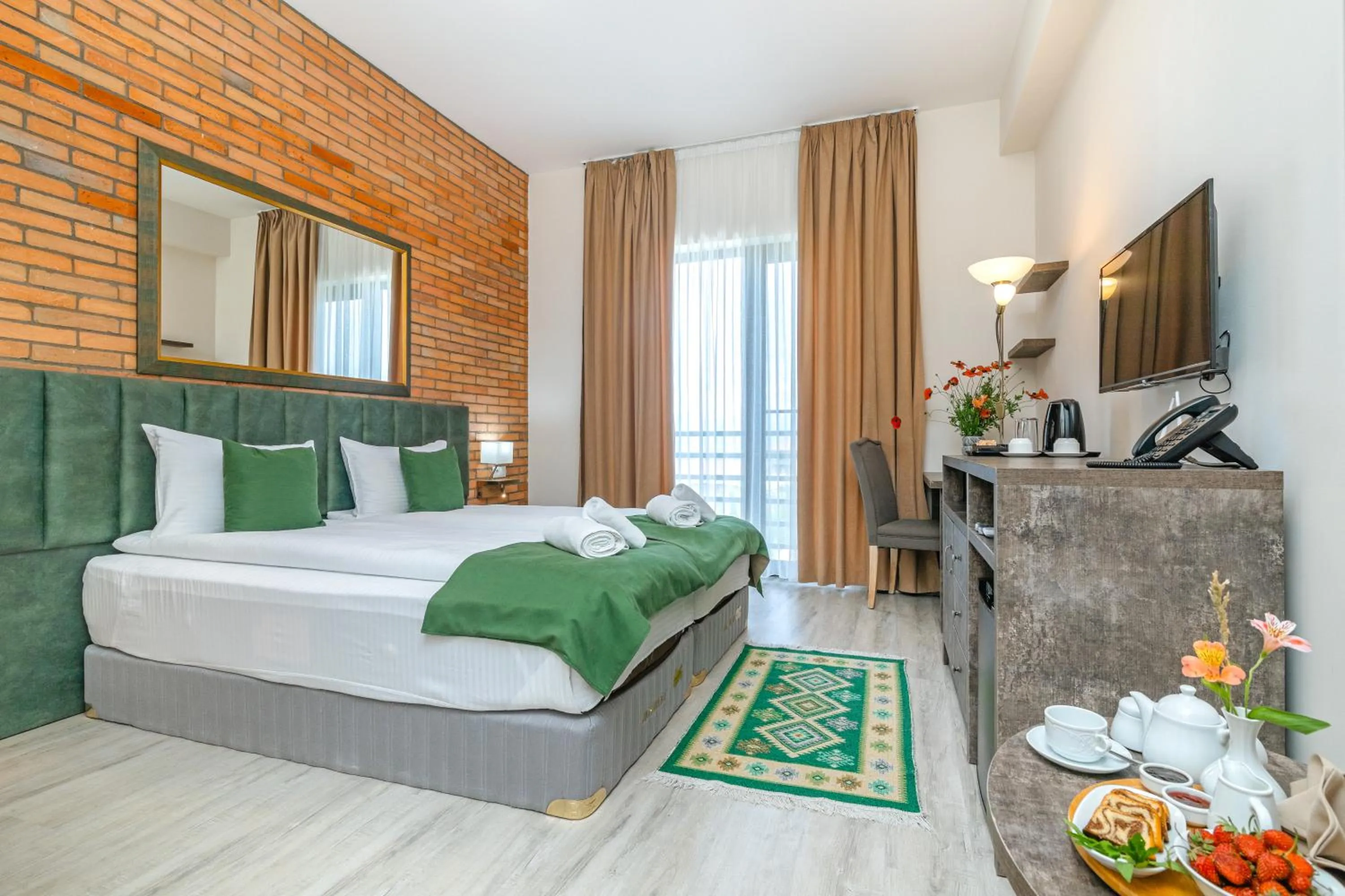 Photo of the whole room, Bed in Château Mosmieri Hotel & Winery