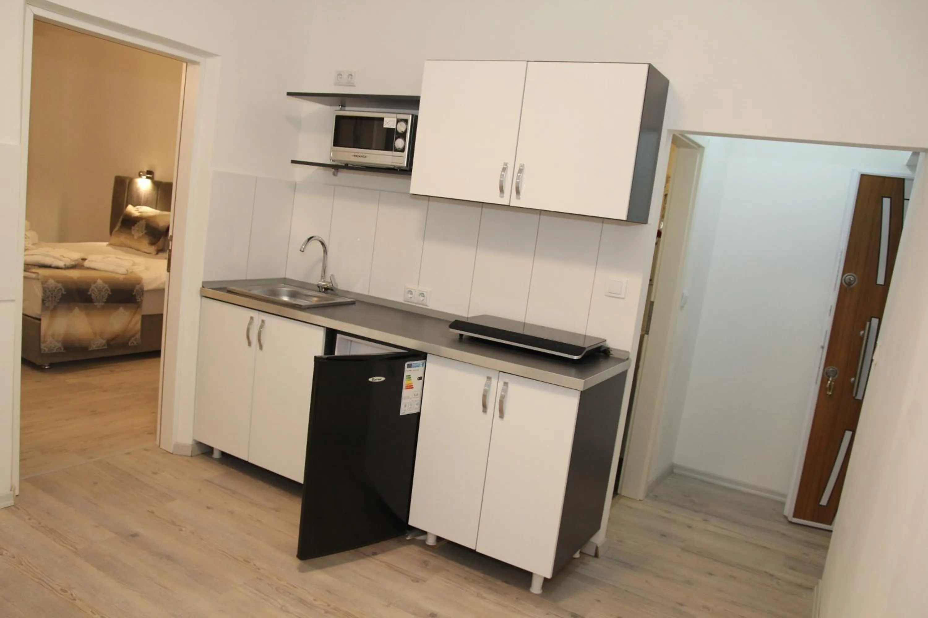 Kitchen or kitchenette in Kispet Deluxe Hotels&Suites