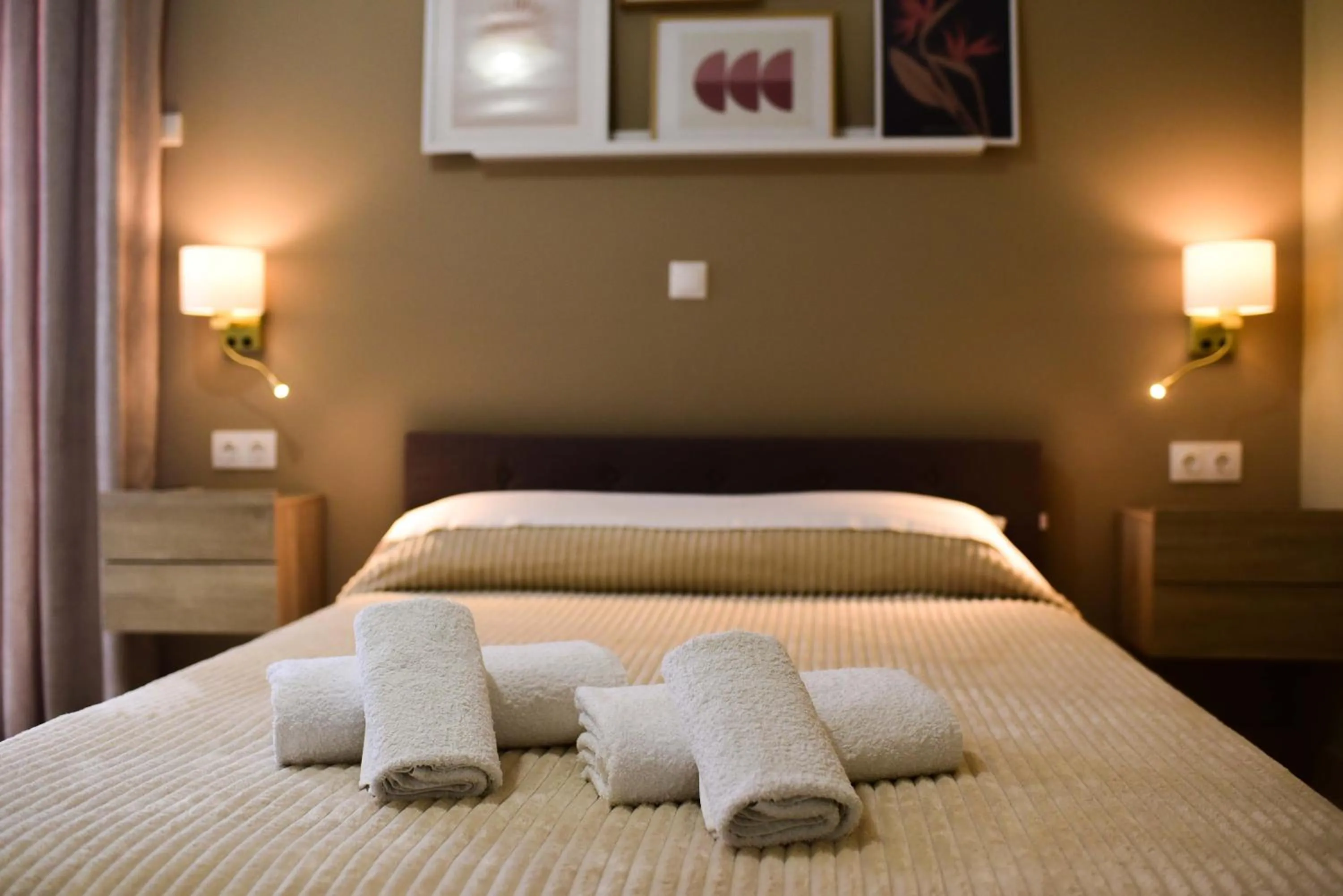 Bed in Vasilios Marinos Rooms