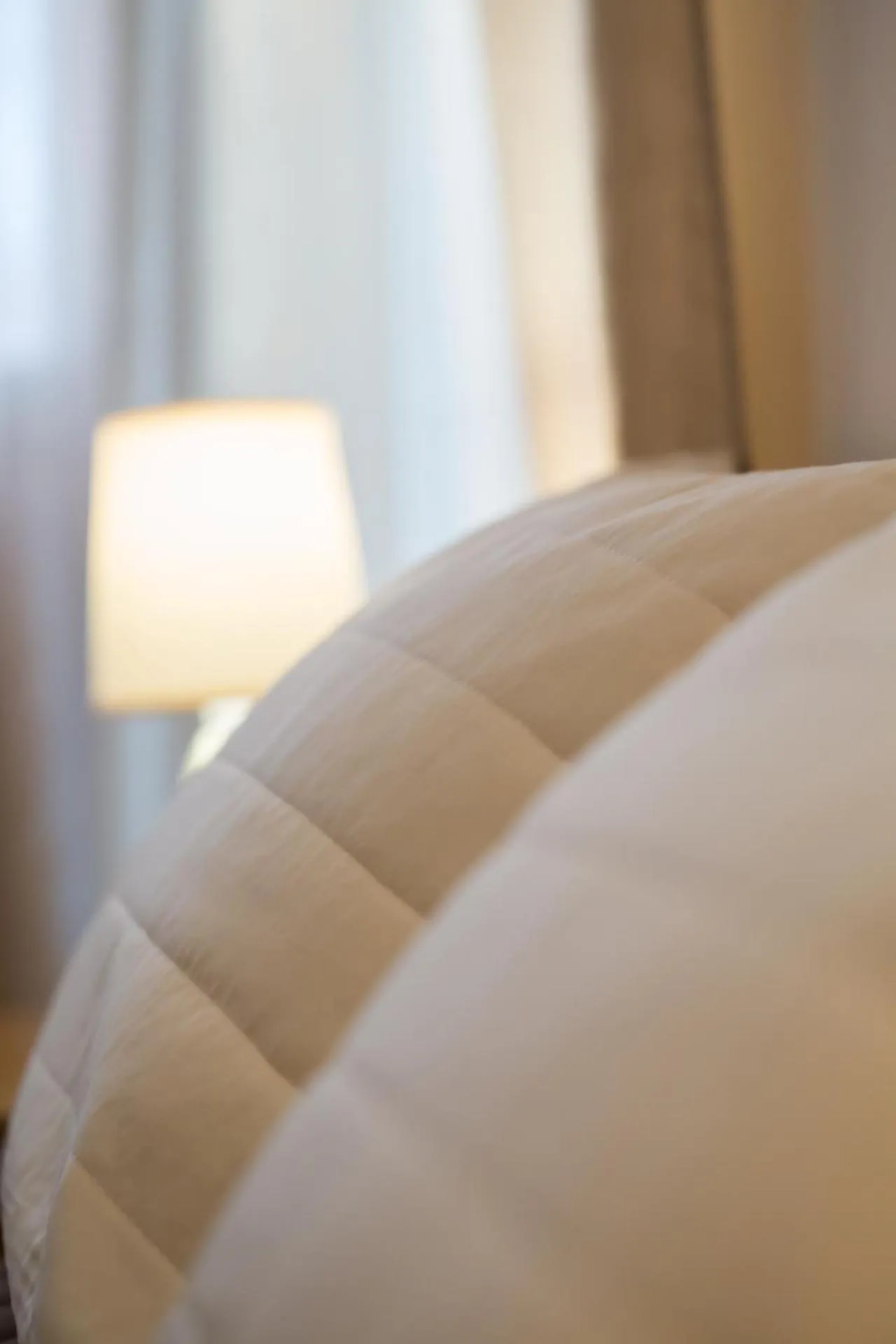 Bed in Vasilios Marinos Rooms