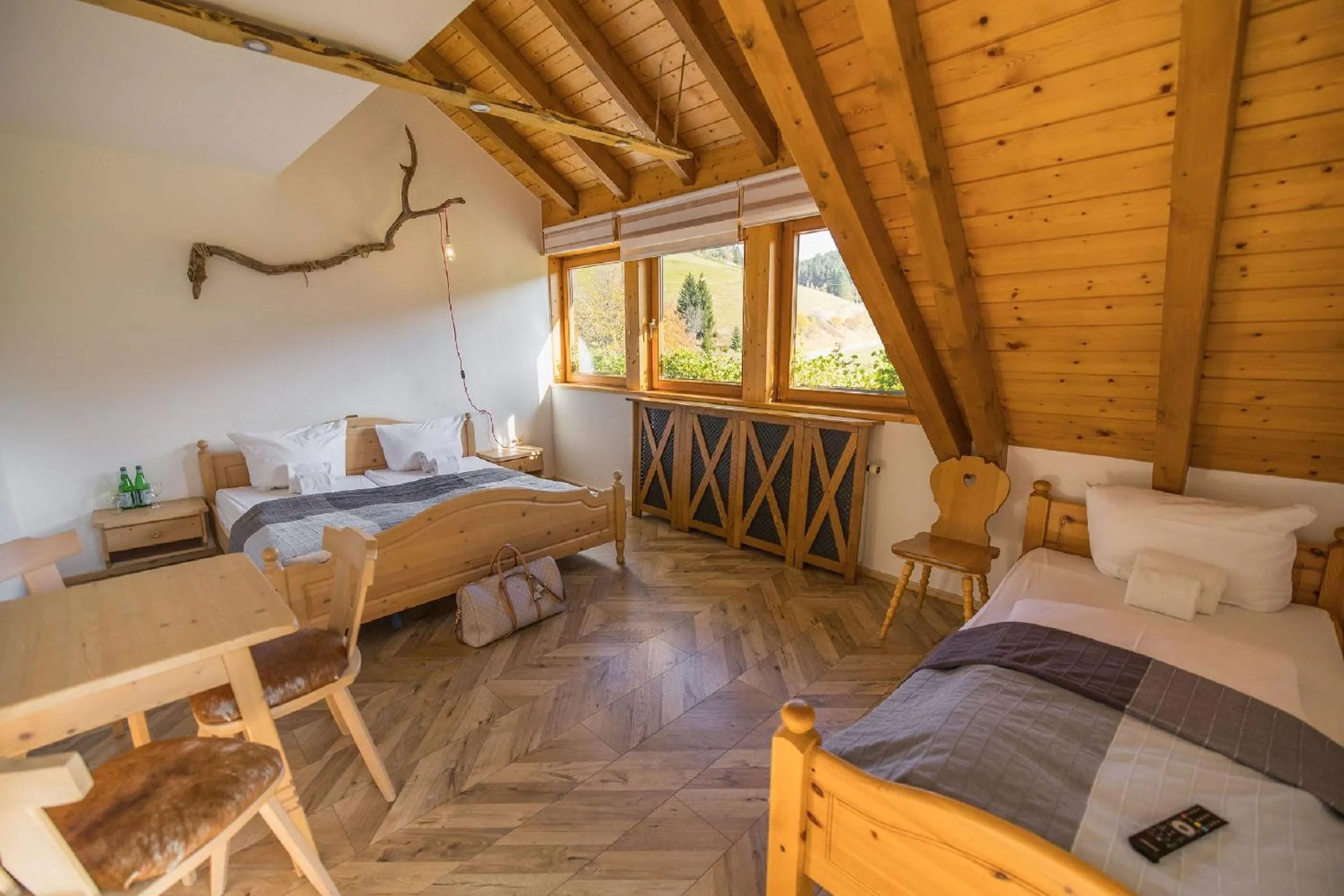 Bed in Berghotel und Restaurant Kräuter Chalet