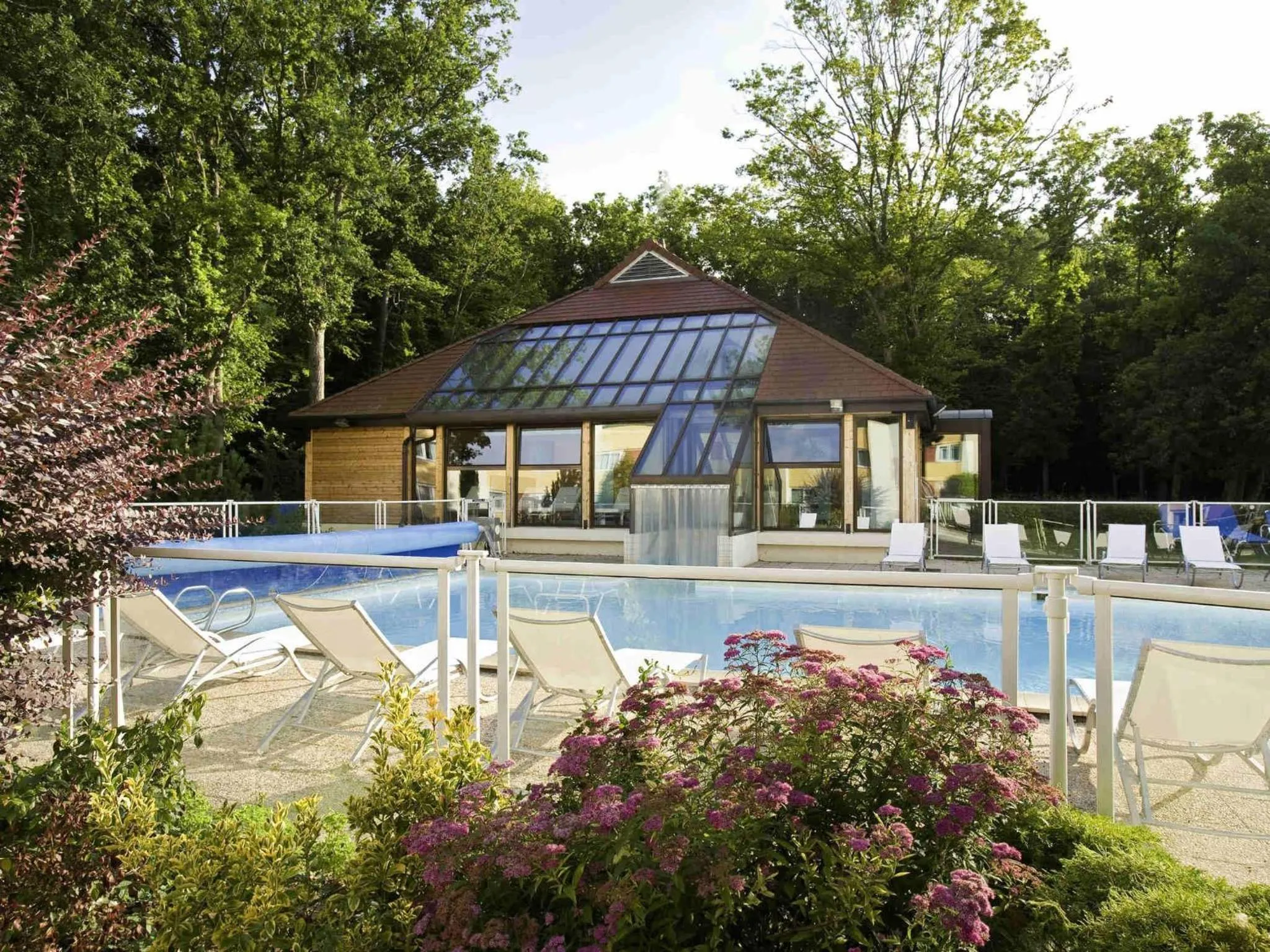 Pool view in Novotel Fontainebleau Ury
