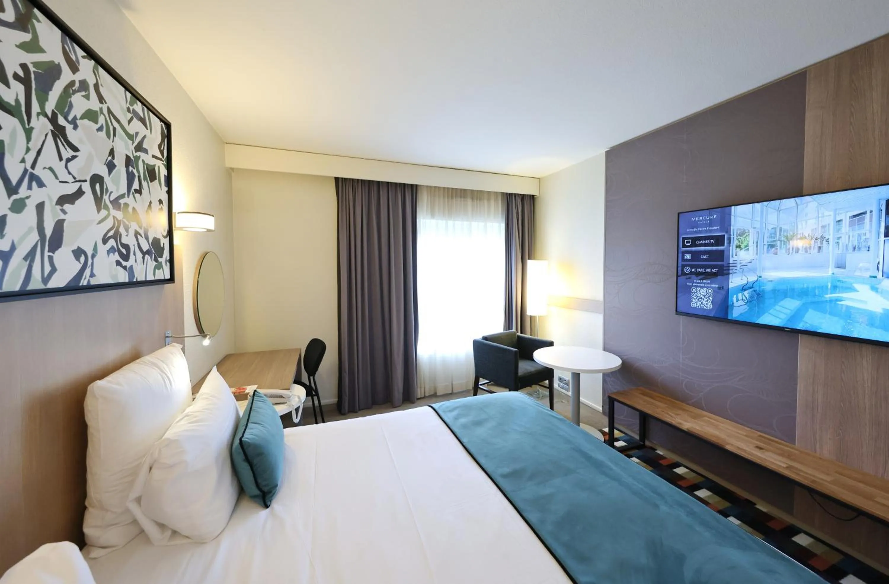 Photo of the whole room, Bed in Mercure Grenoble Centre Porte des Alpes