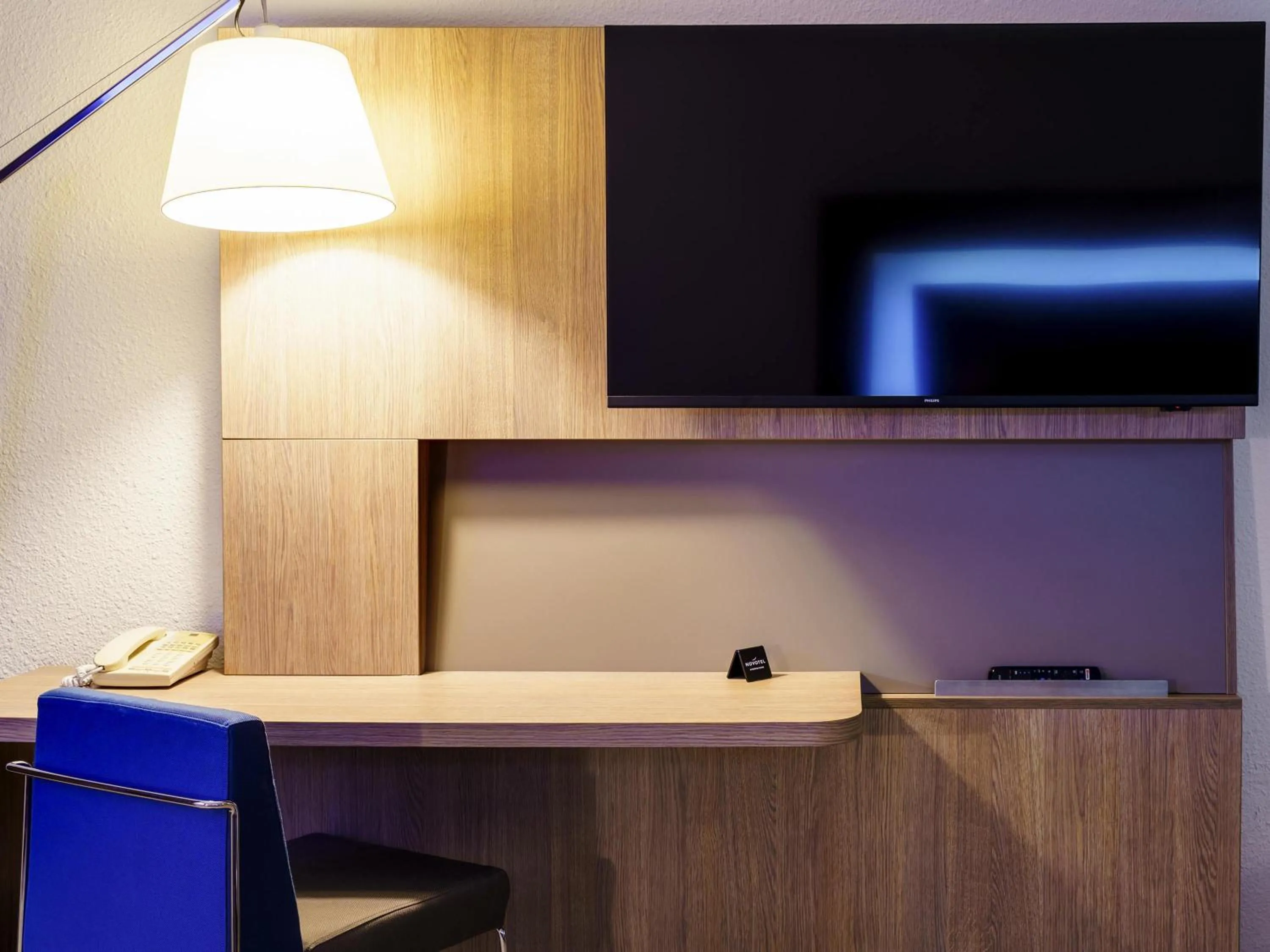 Bedroom in Novotel Avignon Nord