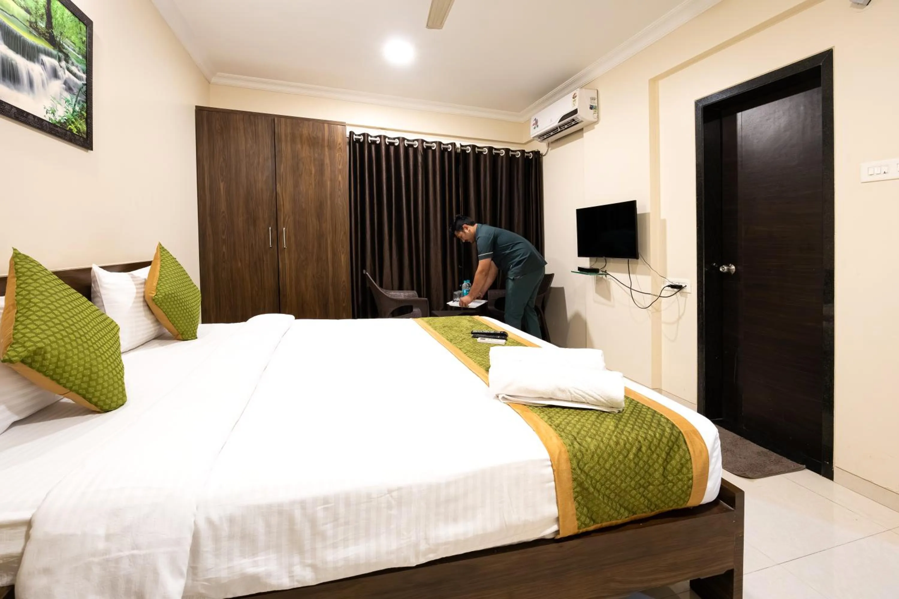 Bed in Kedari Residency