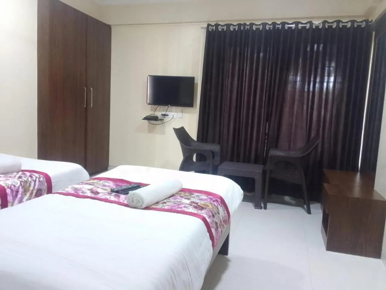 Bed in Kedari Residency