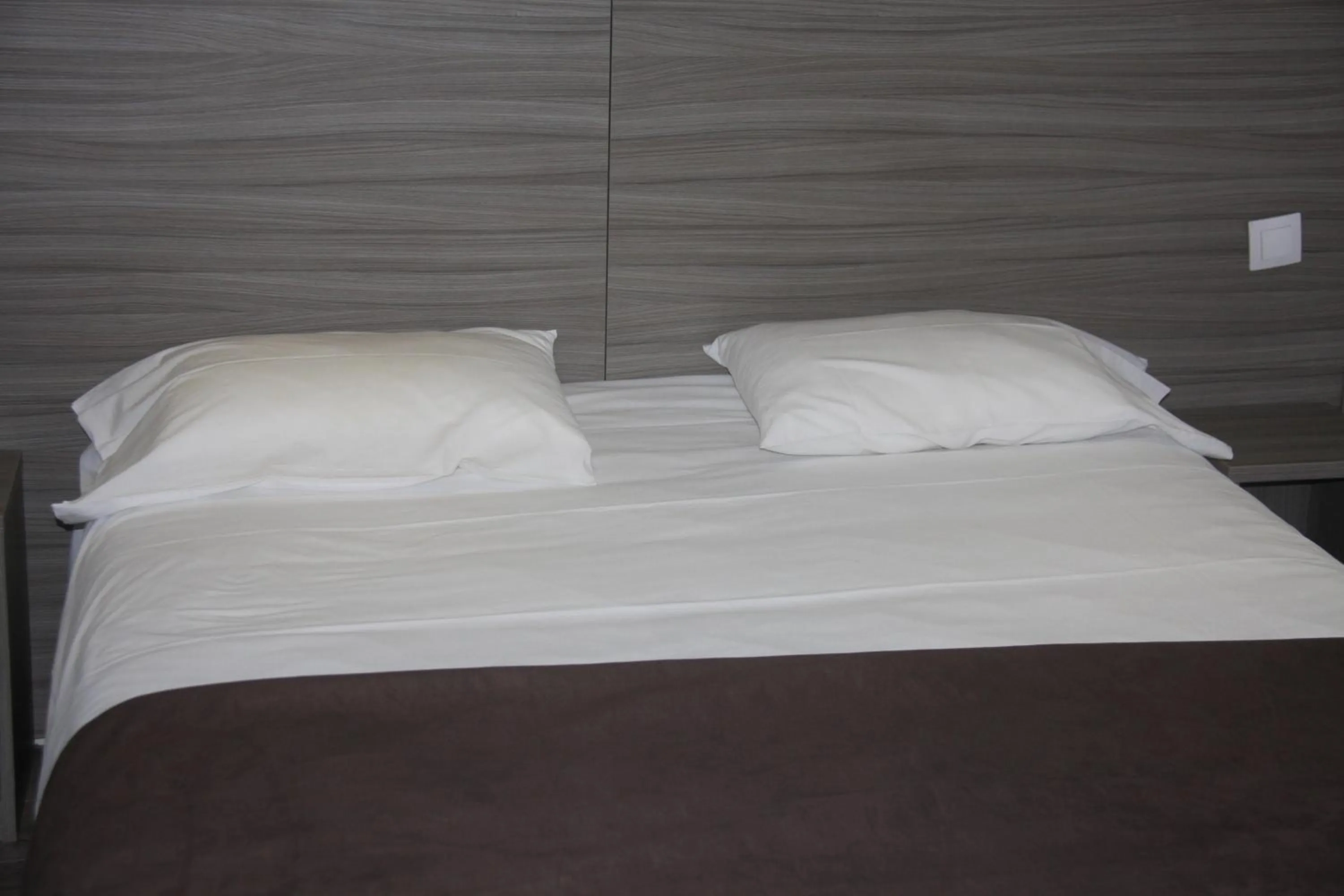 Bed in Hotel PARIS GAMBETTA- PANAMHOTEL-PERE LACHAISE