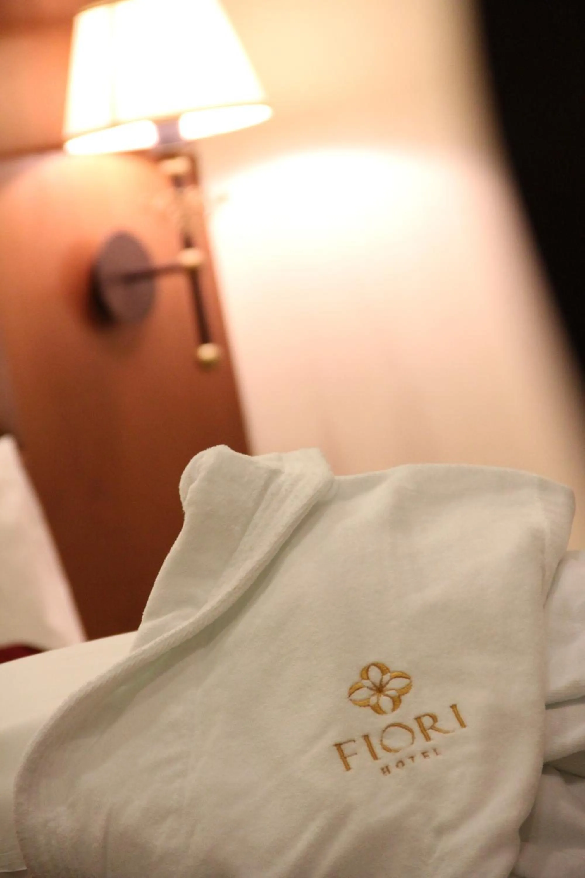 towels, Bed in Fiori Hotel