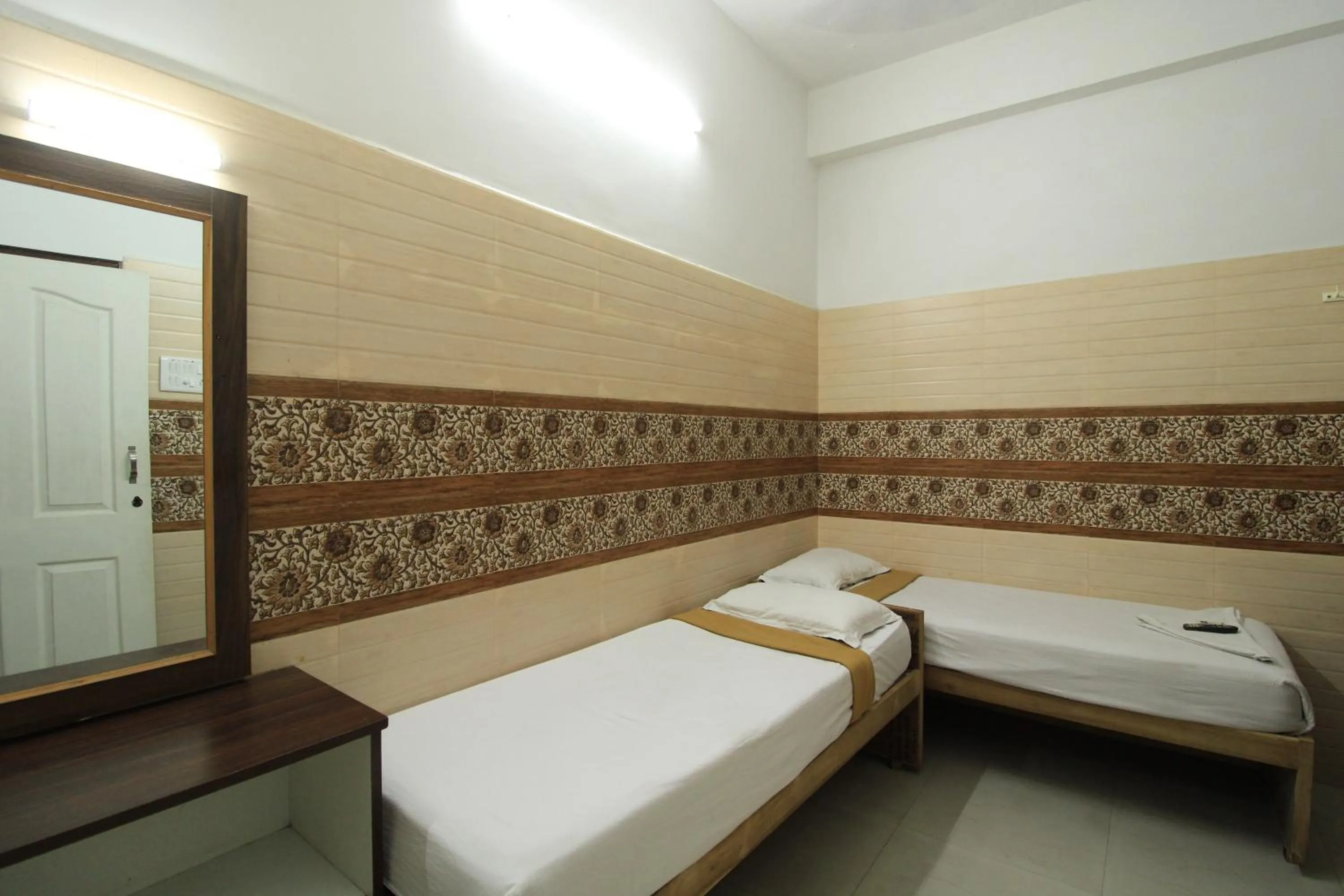 Bed in Just Guest House, Chennai Airport