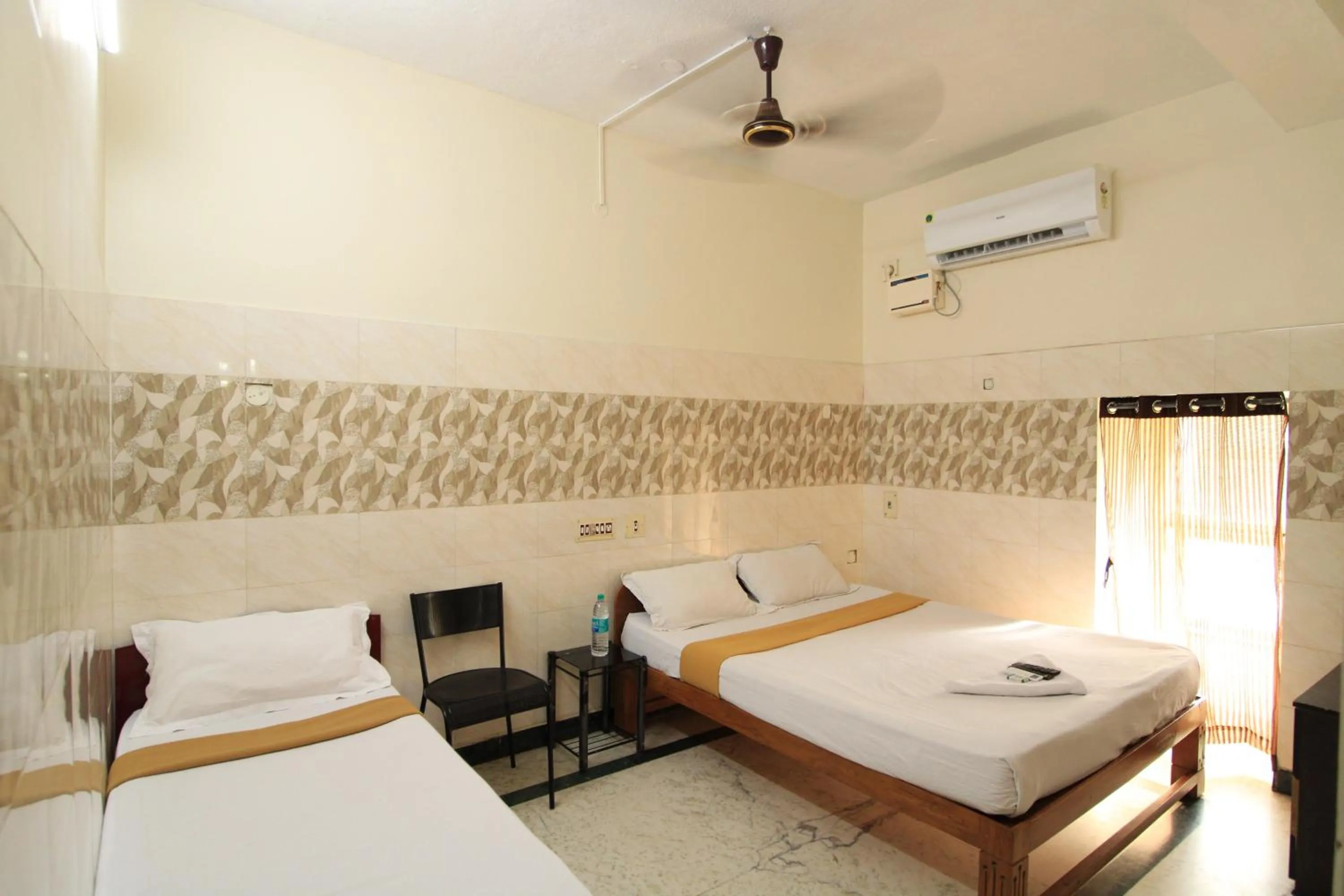 Bed in Just Guest House, Chennai Airport